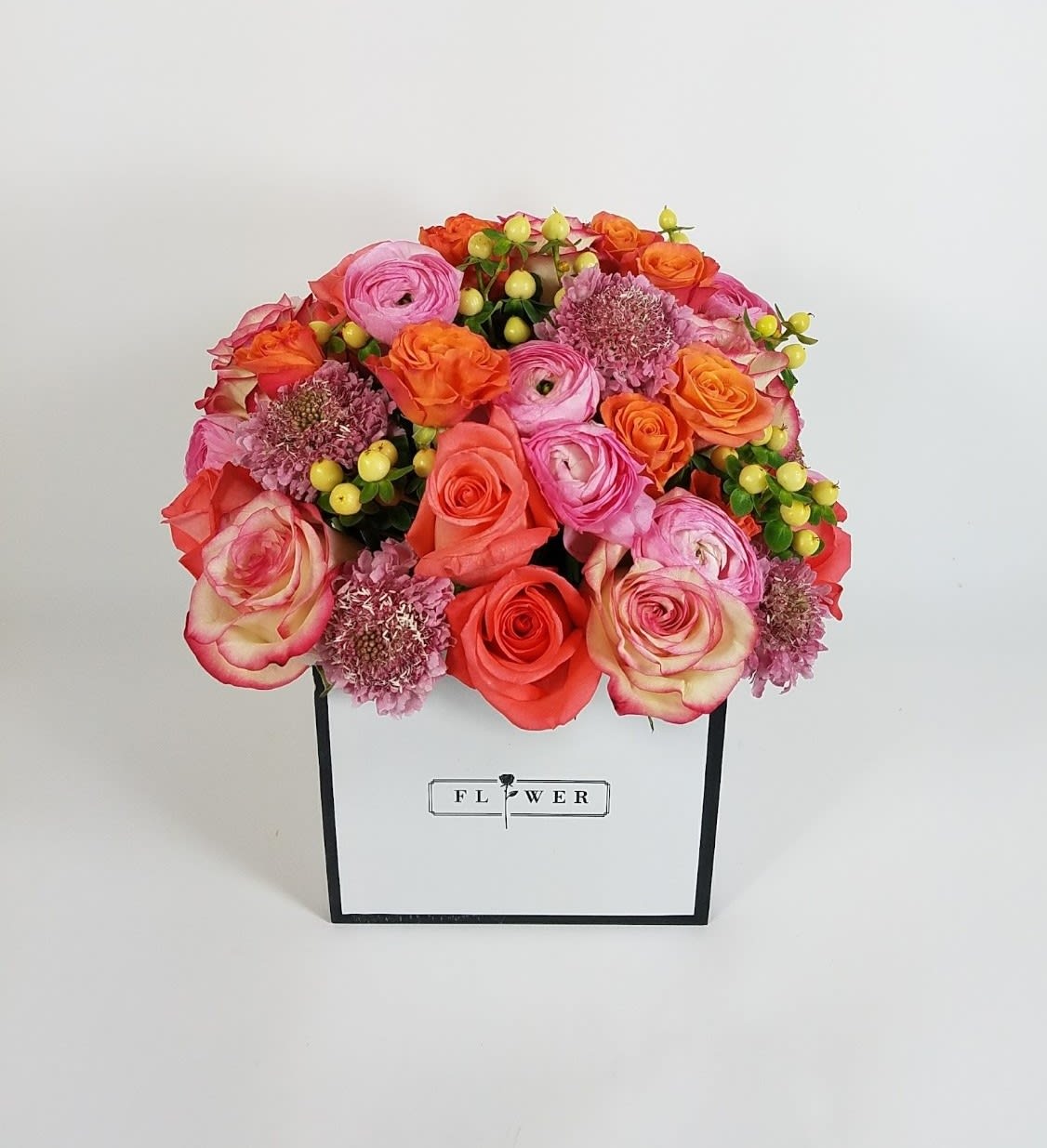Love Potpourri Box - A box full of 16 Premium roses, 8 ranunculus, and greenery 