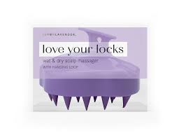 Wet & Dry Scalp Massager - Very Violet Wet & Dry Scalp Massager - Very Violet - Keep your scalp clean and your hair happy! Erase tension, deep clean roots and wash stress down the drain with a spa-quality massage in the comfort of your own shower. Flexible silicone bristles gently remove build-up, stimulate hair growth and distribute your hair’s natural oils for salon-worthy hair care in the palm of your hand. Includes handy hanging loop.