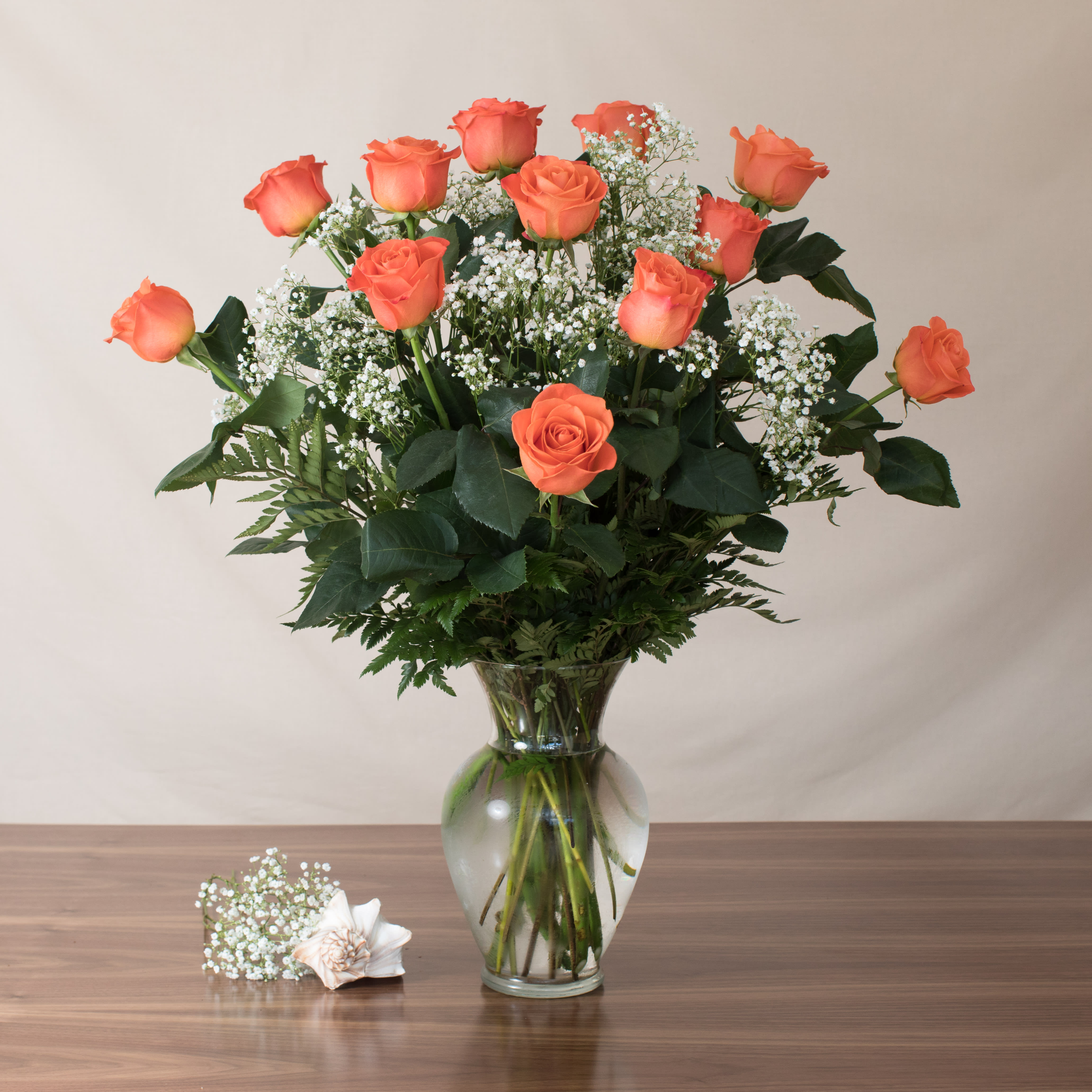 Orange Rose Masterpiece - Gorgeous Orange roses, one dozen long, with fillers and greens.  Brighten up someone's day!  