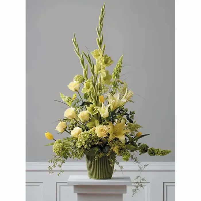 Soft and Sweet - Container with all yellow glads, roses, lilies, and green Bells of Ireland 