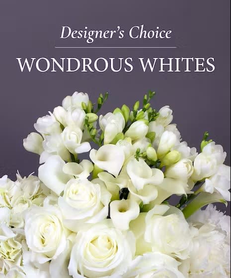 Designer's Choice Wonderous Whites - Let our designers create a beautiful arrangement of beautiful white blooms. Arranged in a vase.