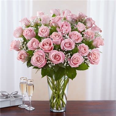1-800-Flowers® Ultimate Elegance ™ Premium Long Stem Pink Roses - Our pretty pink long stem roses are the ultimate way to charm someone special. Two, three or four dozen soft pink blooms are artistically arranged by our expert florists inside an elegant glass vase and personally hand-delivered to help you express how you feel in a beautiful and meaningful way. All-around arrangement with 24, 36 or 48 long stem pink roses; accented with baby’s breath and assorted greenery Our florists select the freshest flowers available, so shade of rose may vary due to local availability Artistically arranged in a classic clear glass vase 48-stem arrangement measures approximately 23&quot;H x 18&quot;L 36-stem arrangement measures approximately 23&quot;H x 18&quot;L 24-stem arrangement measures approximately 23&quot;H x 18&quot;L