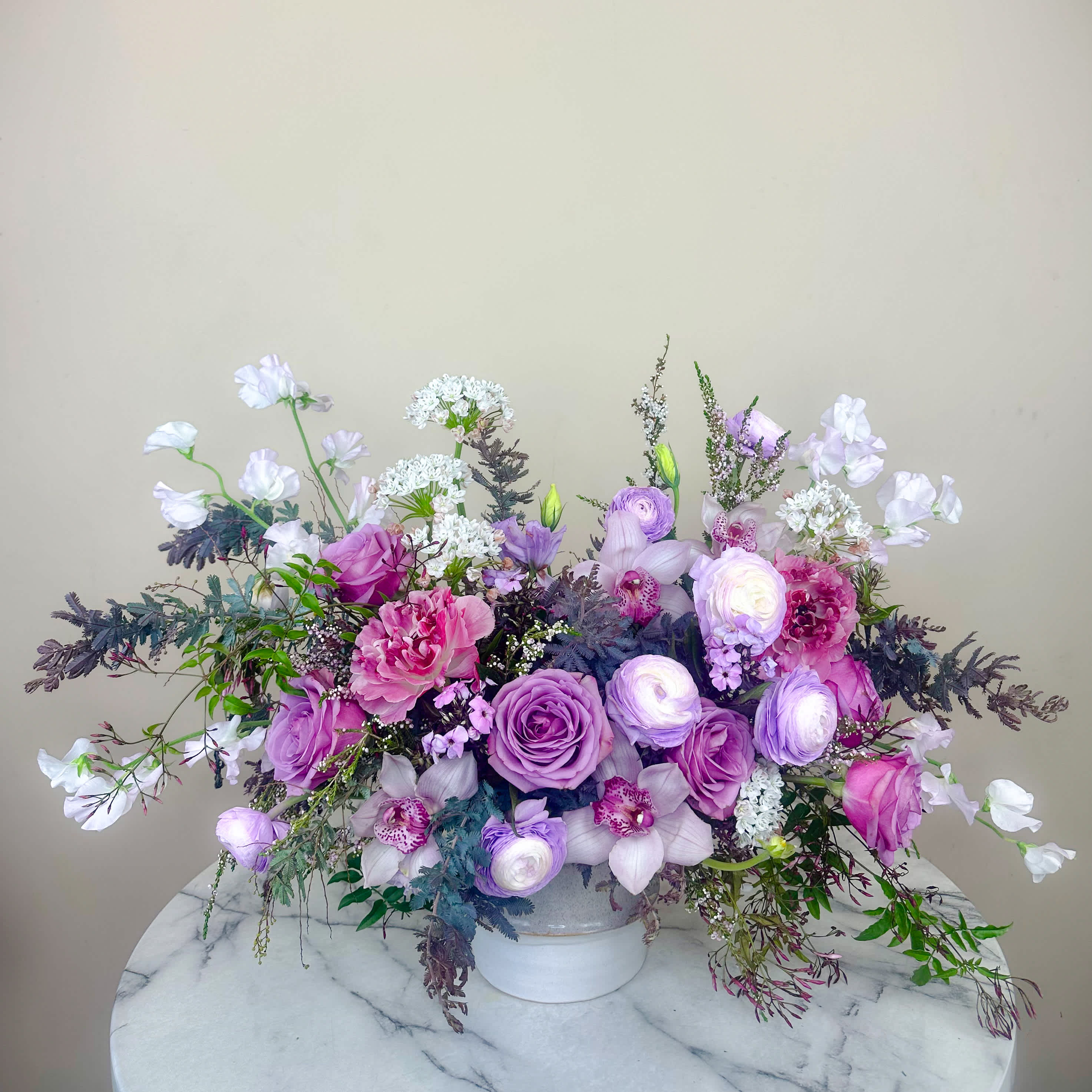 Infinite Plum - Infinitely gorgeous! This plum inspired bouquet is a classic ensemble of monochromatic design crafted in elegance with a modern twist. Trendy in its own right! 