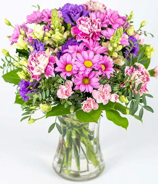 Just Lovely bouquet - This gorgeous hand tied This gorgeous hand tied arrangement is packed full of pink and purple stems, including carnations, chrysanthemums, lisianthus and mixed foliage.  is packed full of pink and purple stems, including carnations, chrysanthemums, lisianthus and mixed foliage. 