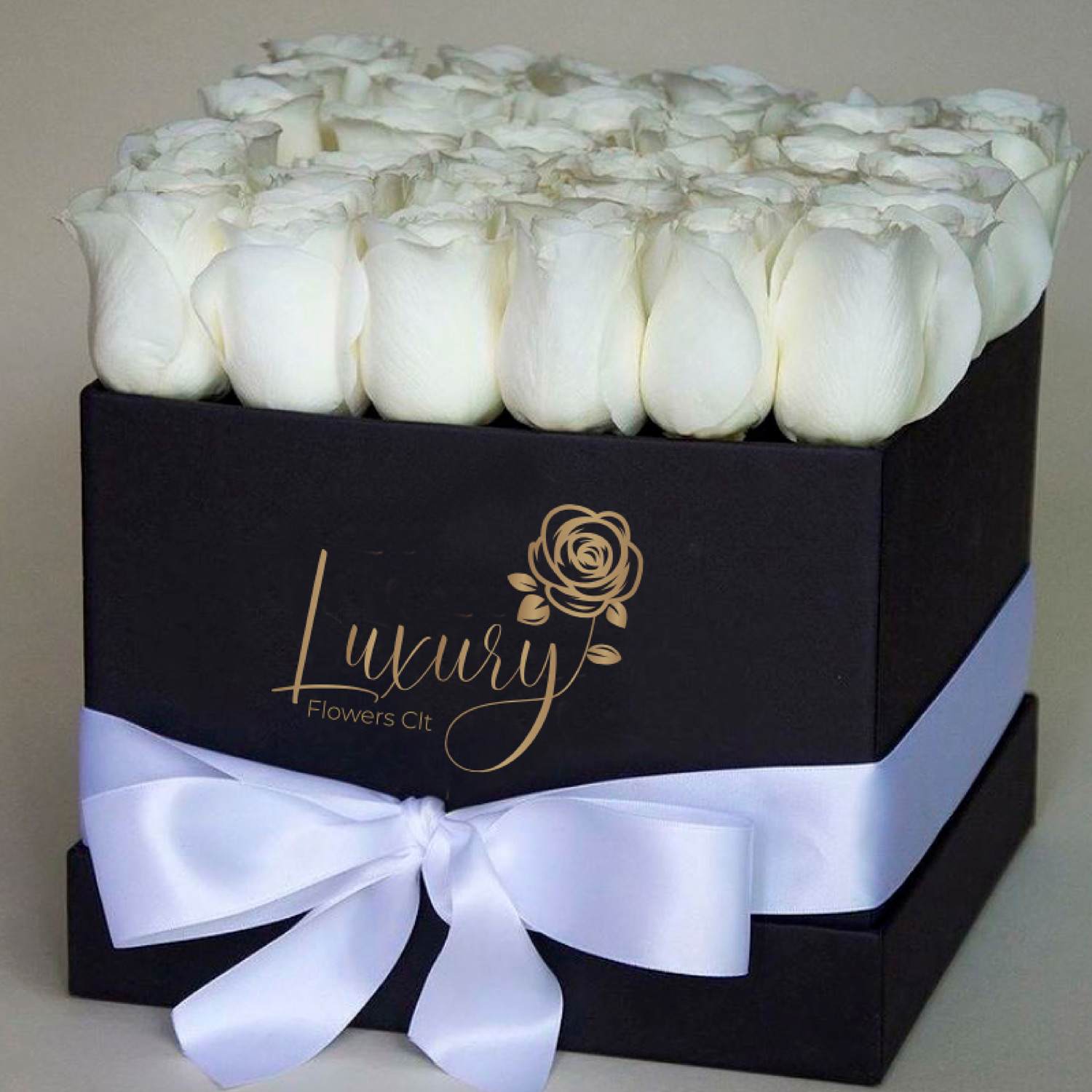Forever Mine-White - •	Roses in Box: 24-30 stems of natural roses. •	Color Flower: White •	Color Box: White or Black (subject to inventory availability) •	All Occasion •	Place your Order Online Monday to Saturday before 1:00 p.m. (E.T.) for same-day          delivery.  •	“Orders received after hours will be delivered the next business day”. •	Check our coverage area. •	Occasionally, substitutions of flowers and/or containers happen due to weather,          seasonality, and market conditions which may affect availability. If this is the case with          the gift you’ve selected, we will ensure that the style, theme, and color scheme of your          arrangement are preserved and will only substitute items of equal value or higher value.  CARE INSTRUCTIONS Gently mist the arrangement with natural water every other day. Do not spray any cleaning product on the flower arrangement. Do not place heavy objects directly on the flower arrangement. Keep them out of direct sunlight and extreme heat. 