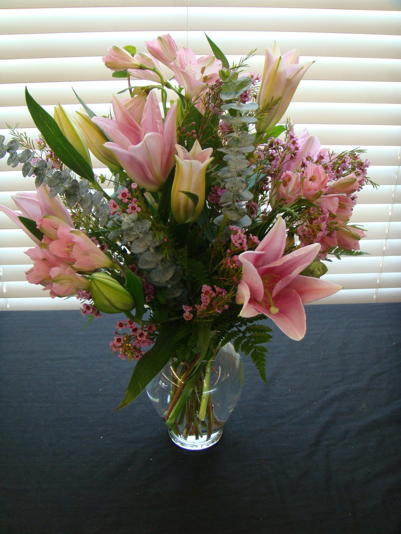 Super Surprise  vase of Lilies    - Super Surprise vase of Lilies   Color of Lilies may vary. The filler will be different than picture due  to shortages in flowers