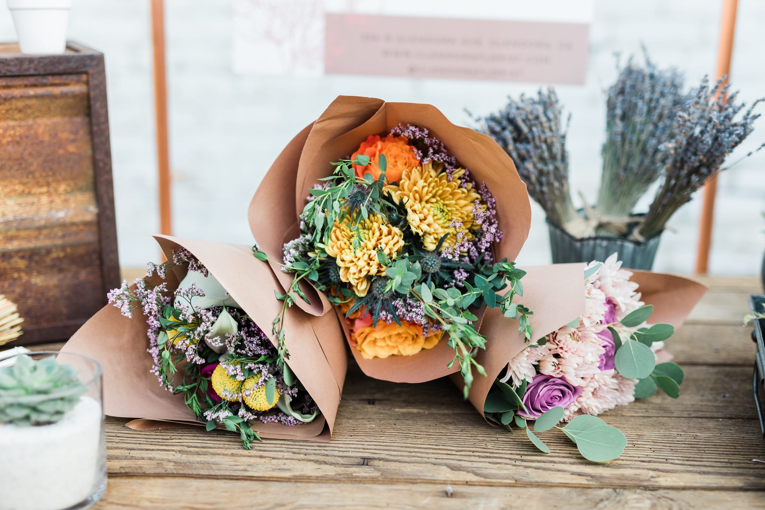 Seasonal Mixed Wrap - Mix of seasonal florals. Standard includes about 6-8 stems accentuated with foliage and textures. 