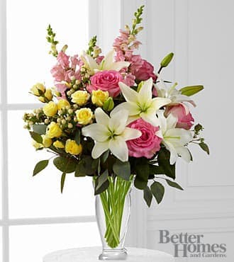 Blooming Rose and Lily Bouquet -  A flower bouquet set to acquire their every attention, this display of roses, lilies and snapdragon stems will convey your warmest wishes through brilliant color and texture.