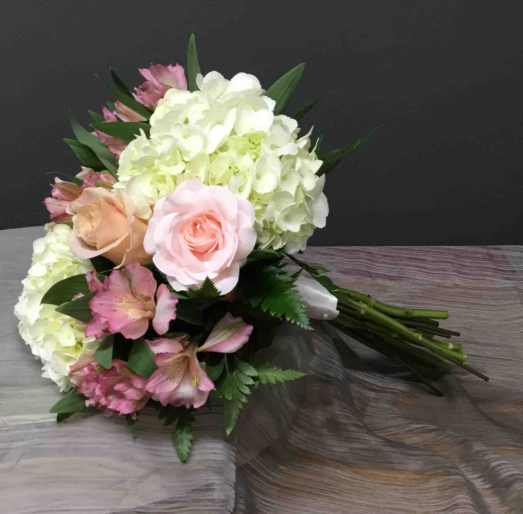Dance Bouquet - Handheld and Wrapped Bouquet, Hydrangeas, Roses, Alstromeria. Call 816-858-2457 to customize