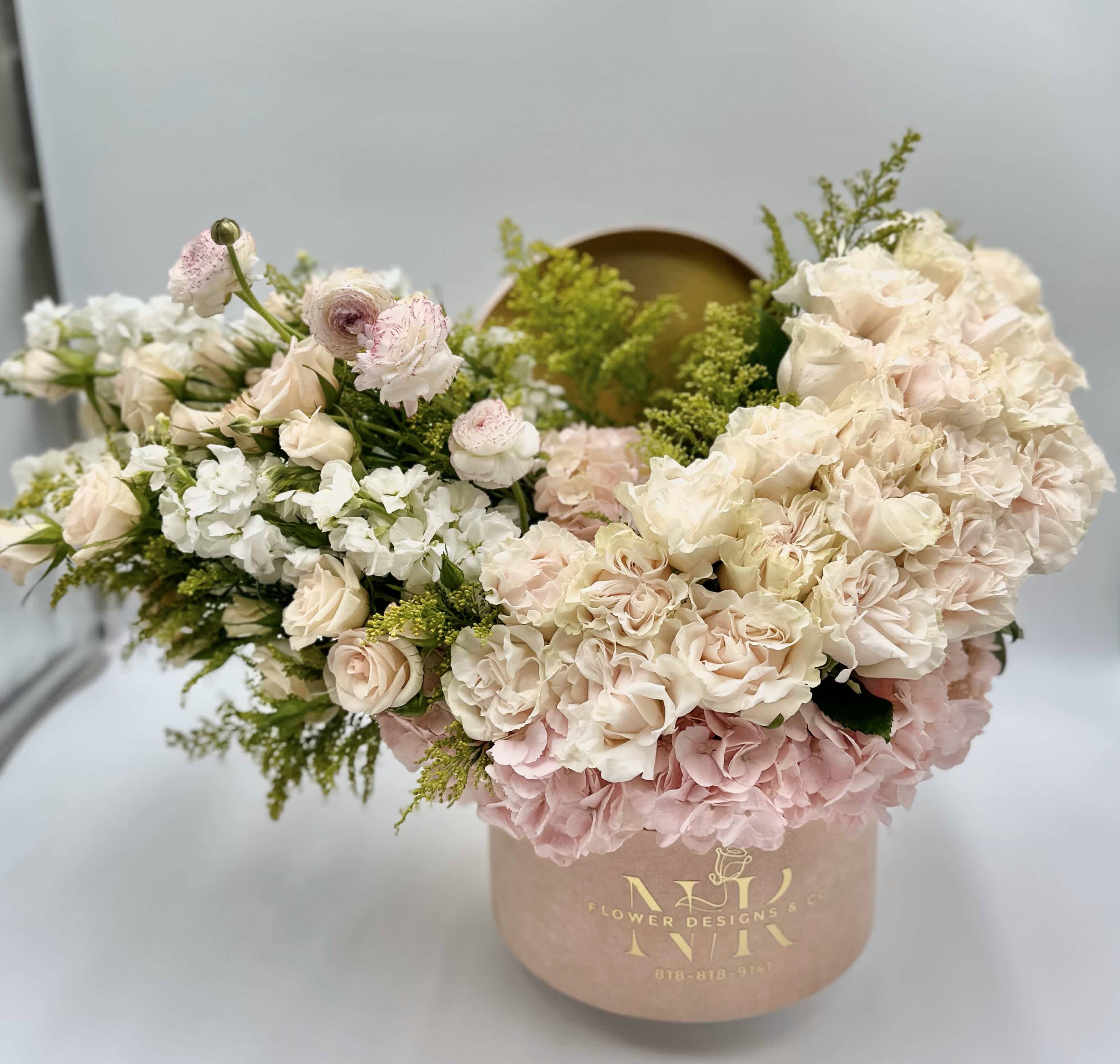 Spring Bloom Box! - Chic Spring Bloom in a luxury velvet box! Beautiful flower combination, along with roses and ranunculus, makes this unique arrangement.