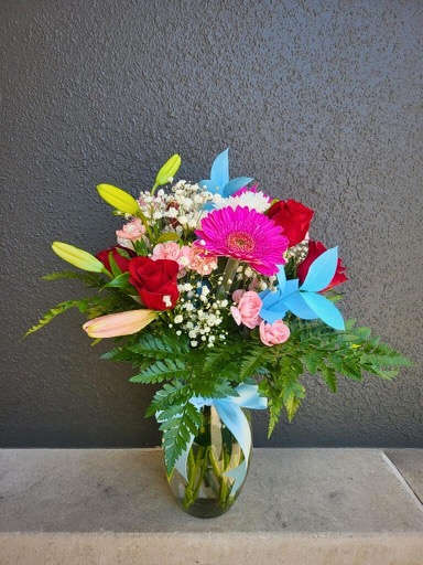 Baby Love - Send a mom &amp; her new baby loving wishes with this arrangement filled with daisies, roses, lilies, and love. 