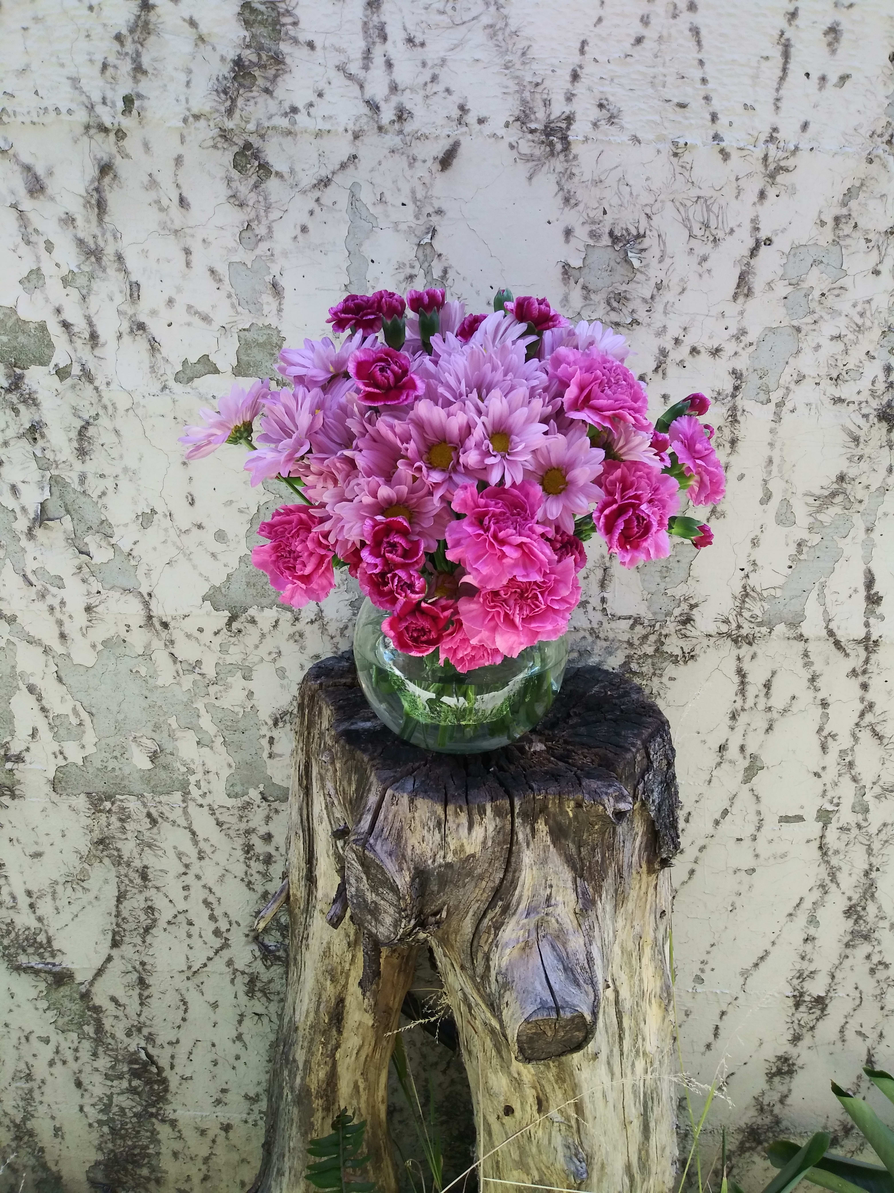 Daisy Thoughts  - A mixed flowers vase of lavender and purple carnation and daises. 