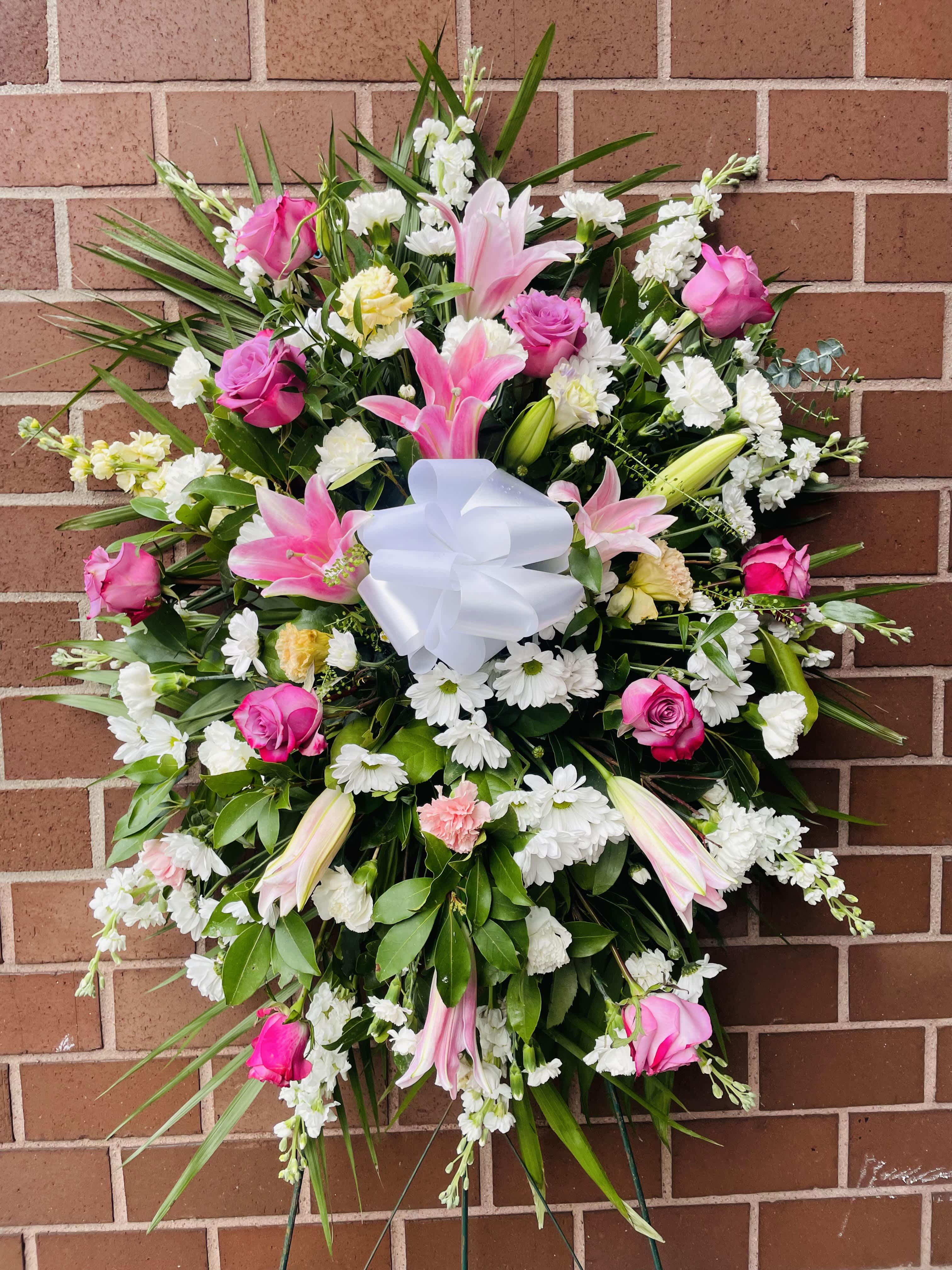 Sympathy Standing Spray 1 Sympathy Standing Spray 1 - Pink Carnations • Whit Spray Chrysanthemums • Pastel Roses -Lilies • Decorative Ribbon • Sympathy Stand