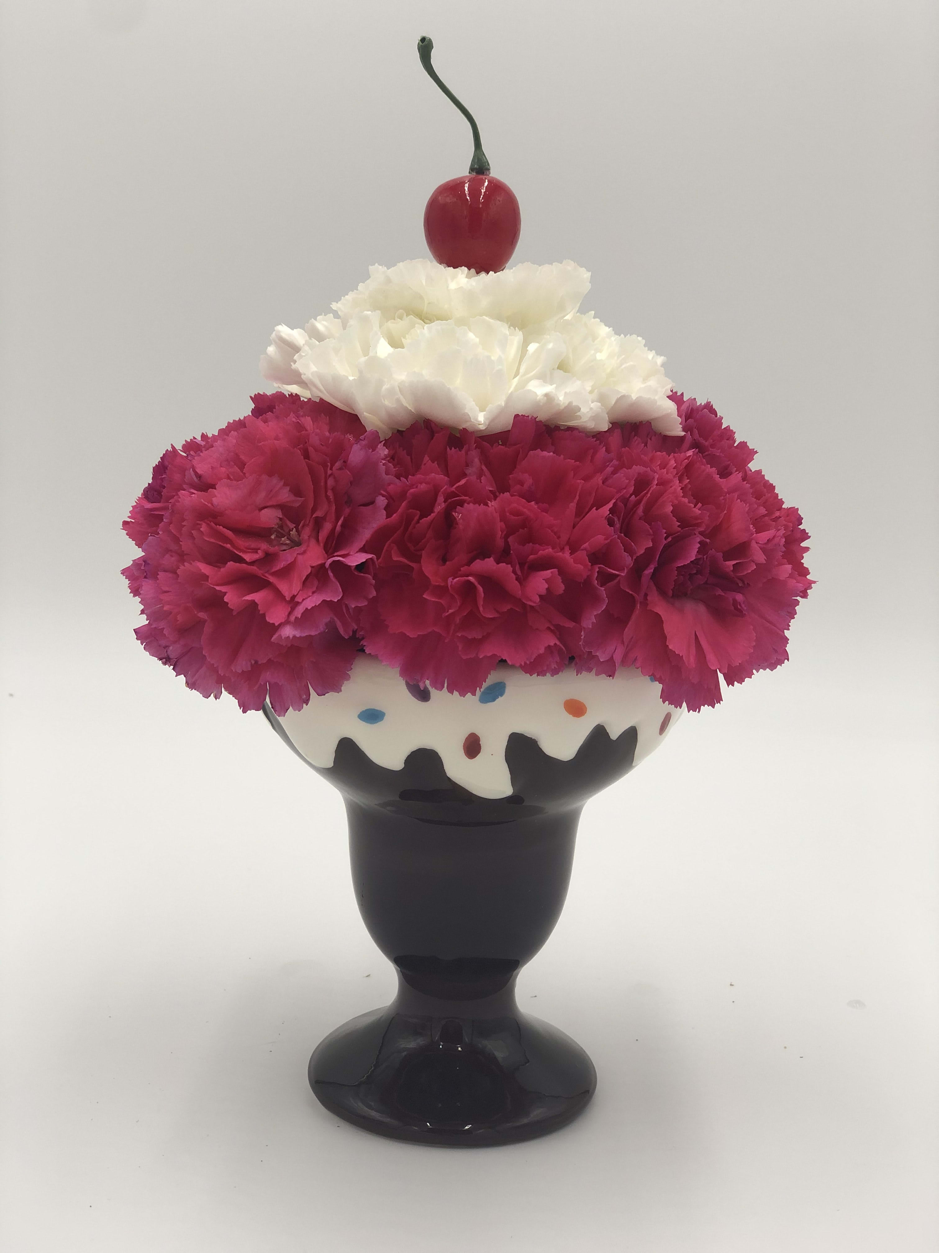 Sundae - Calorie free sundae! Made of fresh carnations with a cherry on top. Great for any occasion.  Container comes in 4 assorted colors and will be chosen at random for the order. 