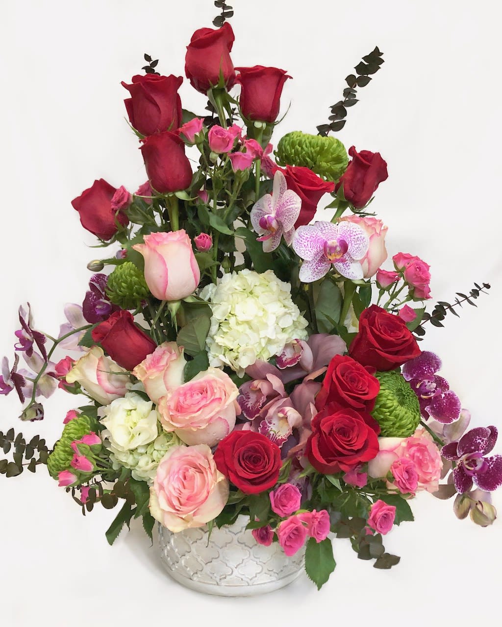 Everything Everything - Filled with the classics-- pink and red roses-- and topped with extra special touches of cymbidium orchids, this flower arrangement is EVERYTHING!