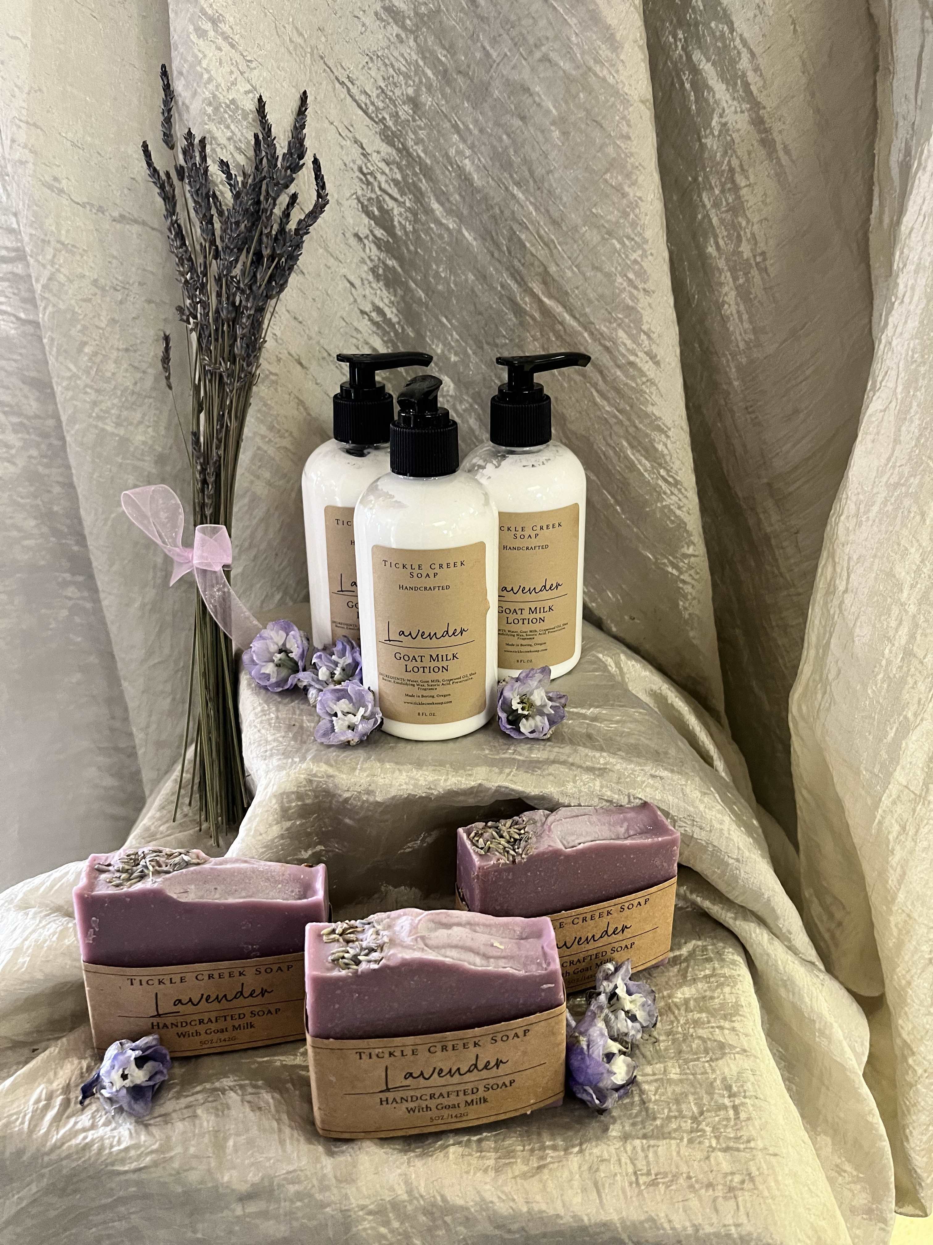 Tickle creek handcrafted lotions and soaps - Goat milk hand crafted  soaps  and lotions in scents of Lavender  and Love  Spell  soap are$9.00 each Lotions are $15.00 each  Gift set $ 25.00 package in clever tent bag  Note florals in picture are not included in  cost - sold seperatly ) All smell heavenly!