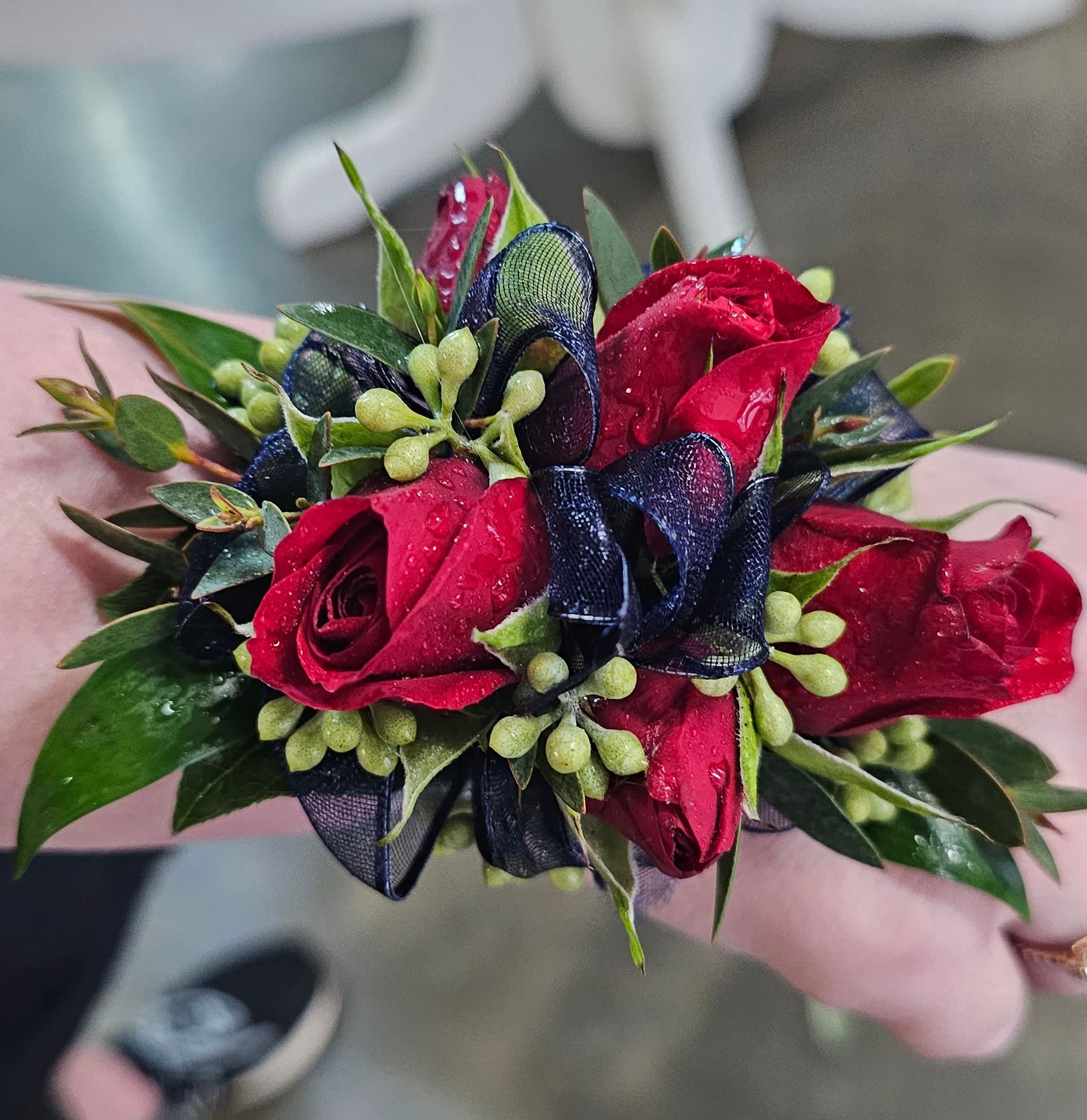 Corsage Prom Special Spray roses with greenery Please send colors and inspiration pictures to flowers@theforevermorefarm.com - Prom Special with Free boutonniere to match. Please send specific colors and inspiration pictures to flowers@theforevermorefarm.com