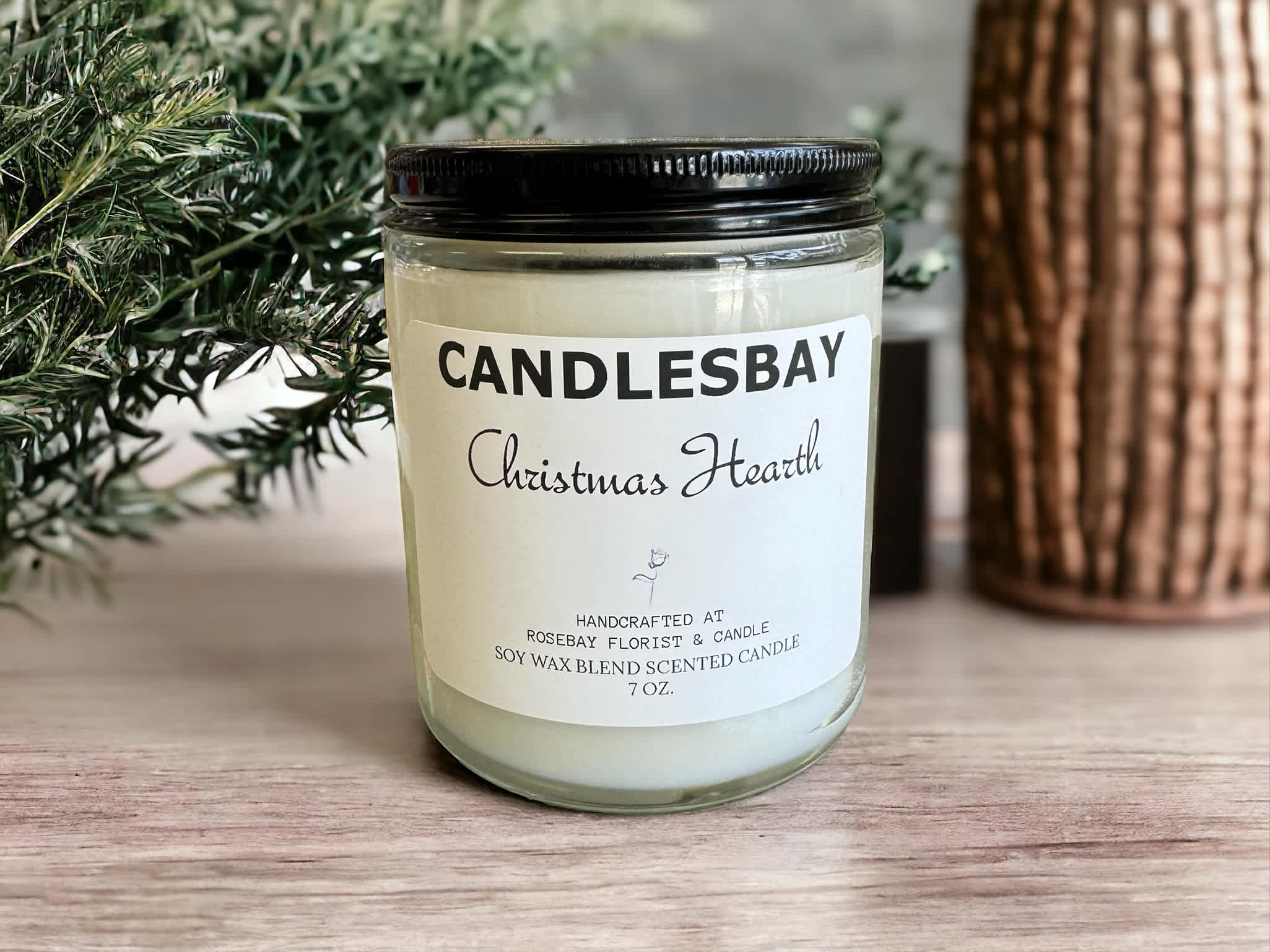 Christmas Hearth SOY WAX CANDLESBAY Christmas Hearth SOY WAX CANDLESBAY - A handcrafted scented soy blend candle at our store. The candle is 7 oz, cotton wick.