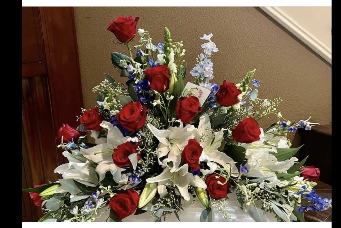 Roses and lilies Roses and lilies - Sympathy arrangement