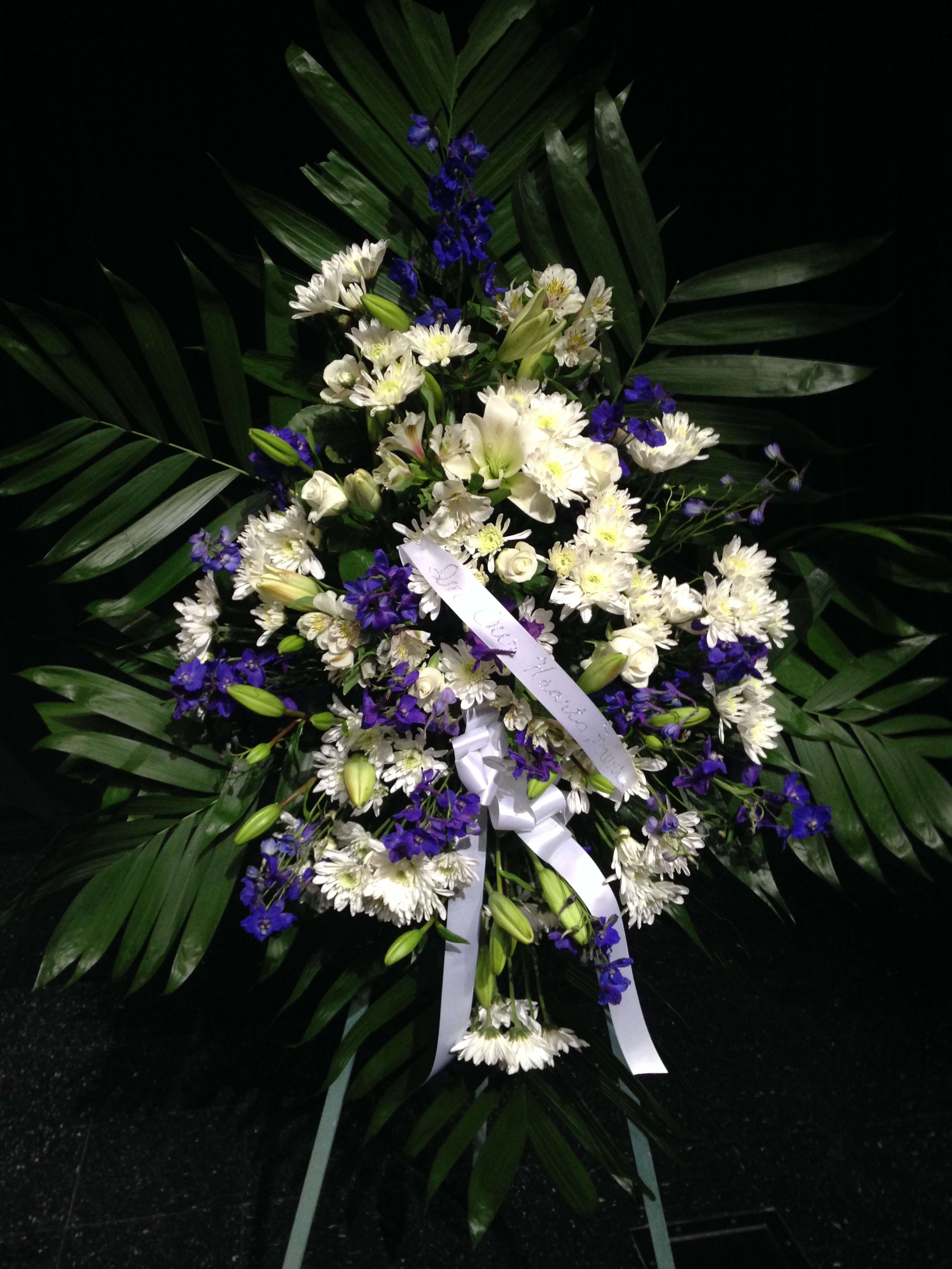 Sympathy spray Sympathy spray - Delphinium and mum spray on an easel