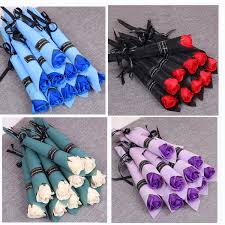 Ten Wrapped Roses - 10 individual Roses of your color pick wrapped. Perfect to give to the staff or several of your loved ones!!