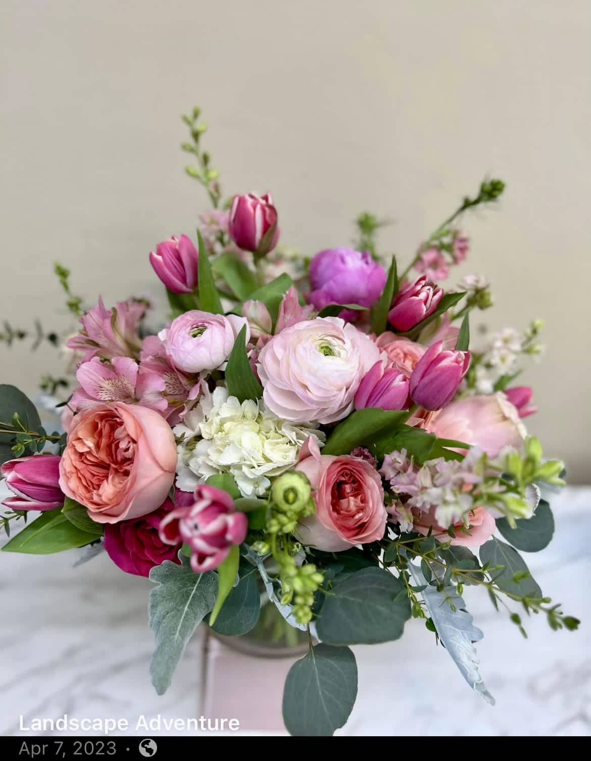 Gardening mix shades of all pink - Roses, tulips eucalyptus All different shades of pink and spring flowers