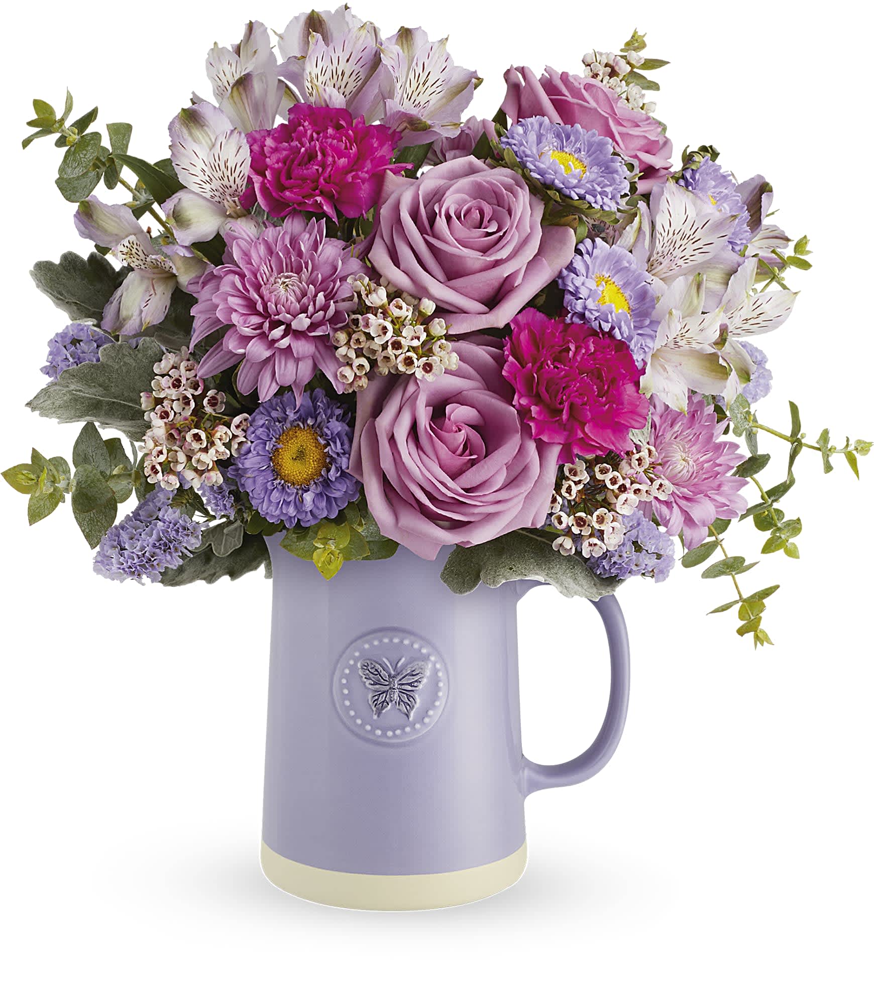 Sweetest Flutter  - Gift mom the artisanal charm she loves with our Teleflora's Sweetest Flutter glazed ceramic pitcher, adorned with embossed butterfly detail and a natural base, perfect for year-round use and sure to add a touch of elegance to any table setting. Surprise her with Teleflora's Sweetest Flutter bouquet-lavender roses, alstroemeria, fuchsia carnations, matsumoto asters, cushion spray chrysanthemums, sinuata statice, pink waxflower, dusty miller, and spiral eucalyptus-in the food-safe glazed ceramic pitcher, featuring embossed butterfly detail, a cherished gift for the artisanal-loving mom. Approximately 14&quot; W x 14 1/2&quot; H
