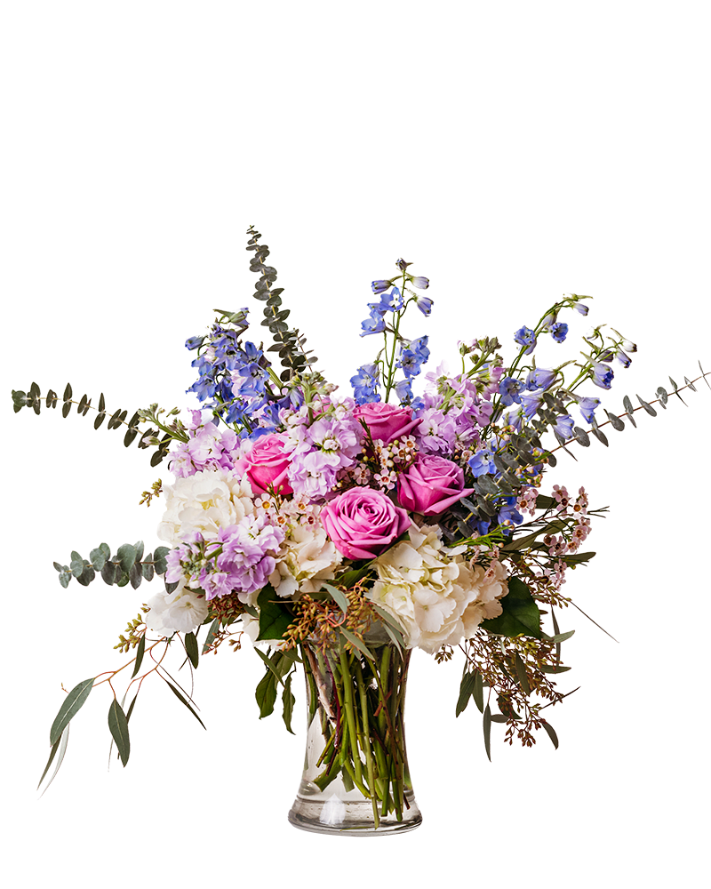 Artistry in Bloom - Happiness in the palette for this arrangement. Artistry in Bloom is as pretty as it sounds. Roses and hydrangeas are tastefully arranged in this cylinder vase.