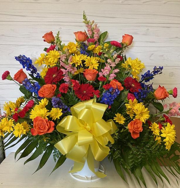 Large funeral basket - funeral basket made with seasonal flowers.