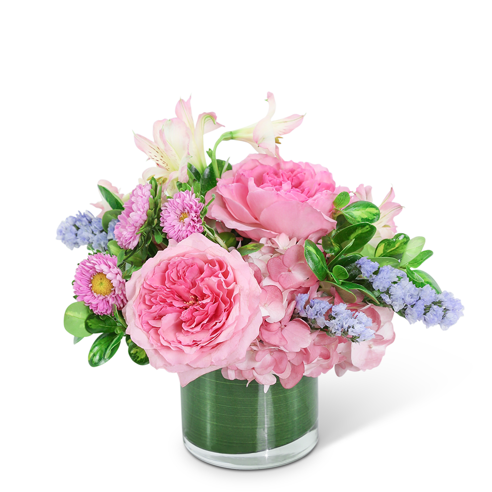 Sweet Pink Clouds - Send your love with this beautiful design, perfect for a birthday, new baby, or romantic gift. Sweet Pink Clouds features pink roses, Alstroemeria, and Hydrangea designed in a leaf-lined vase for a delicate look that will make anyone smile. This unique flower design adds the perfect extra pop of pastel color! We can offer same-day flower delivery in most cases. If you are sending the bouquet directly to your recipient, please provide the complete address and contact information so that we can deliver the flowers directly to them.