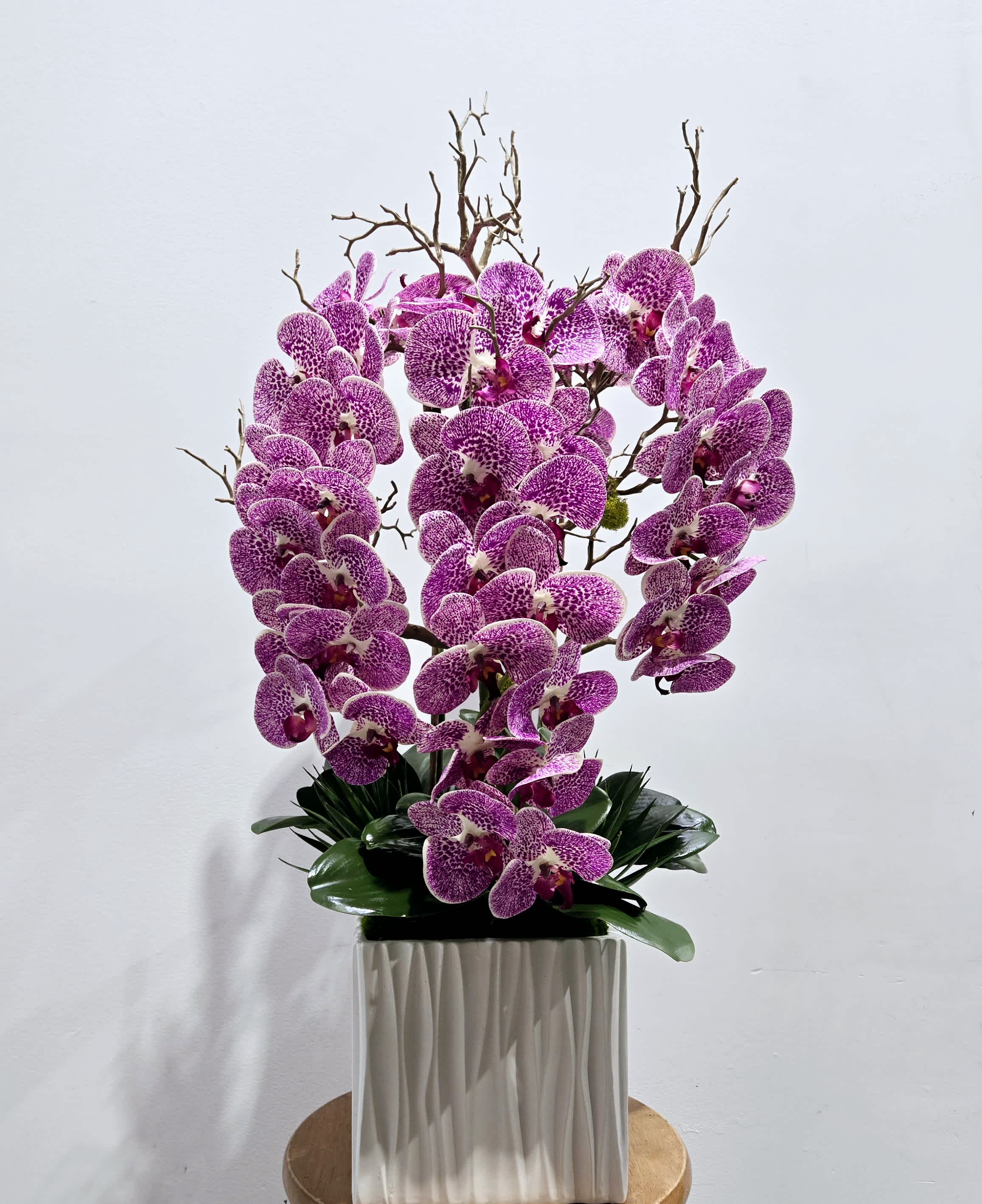 Believe It - This purple faux orchid planter is so realistic and elegant that you won't believe it is not. Perfect for home or office. 
