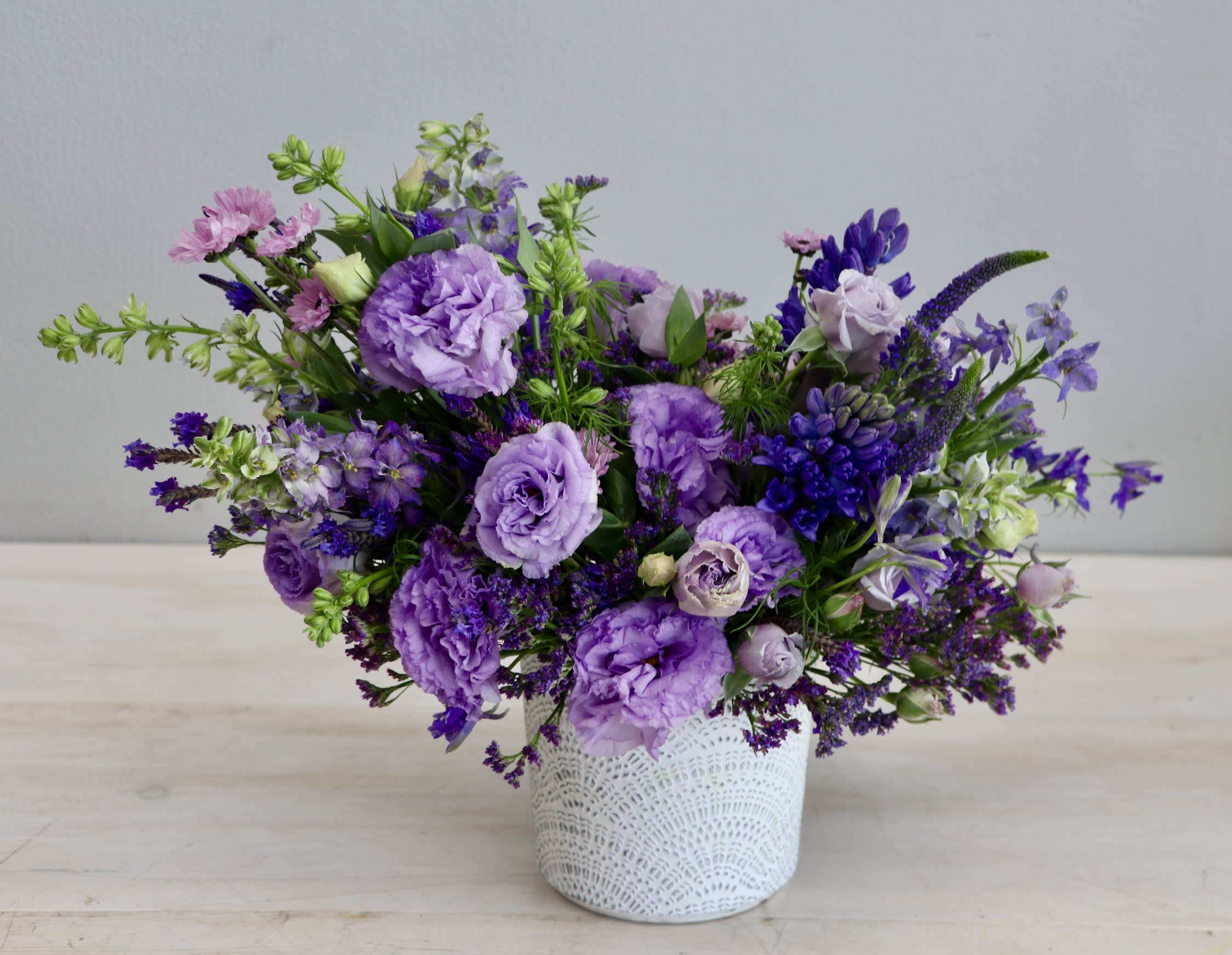 Purple Hues - My Glendale Florist  - Lisianthus is a delicate, pastel-colored flower known for its romantic appearance and long-lasting bloom as a cut flower.