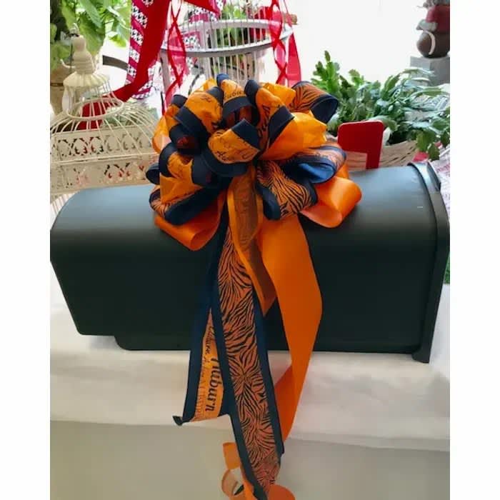 Auburn mailbox bow Auburn mailbox bow - War Eagle! We've made a large bow for your mailbox to show your colors proudly! Easily ties on, and off of your mailbox, or where ever you would like to display it.