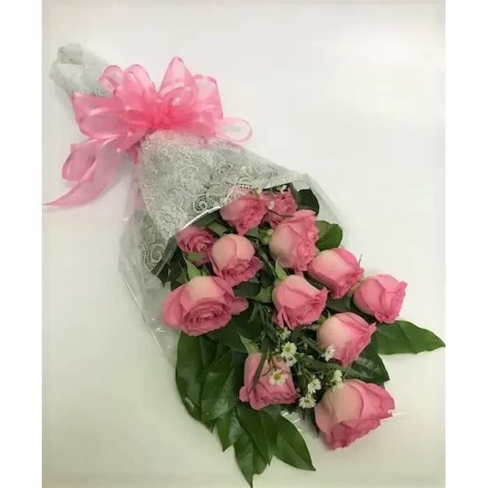 Wrapped In Love - Here's a truly special delivery — one dozen roses, wrapped with ribbon and your undying love. Ask which specialty colors we have in stock today! 