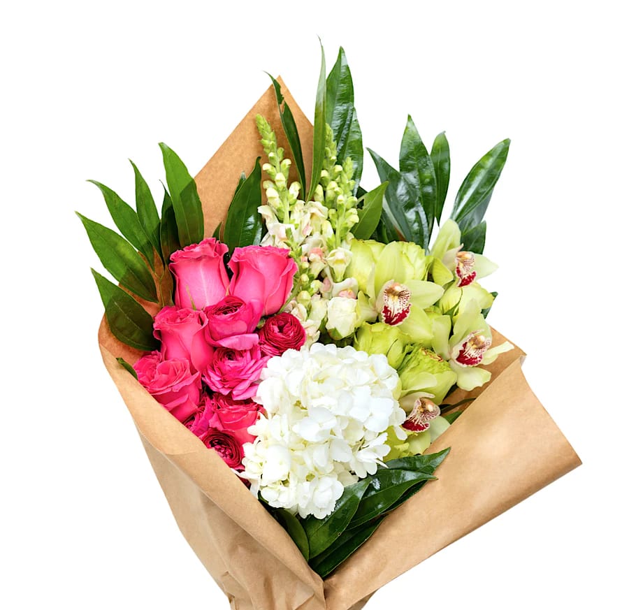 Trendy Tourmaline Bundle - A gorgeous wrapped bundle featuring bright pink, white, and green blooms, such as roses, hydrangea, orchids, and snapdragons. 