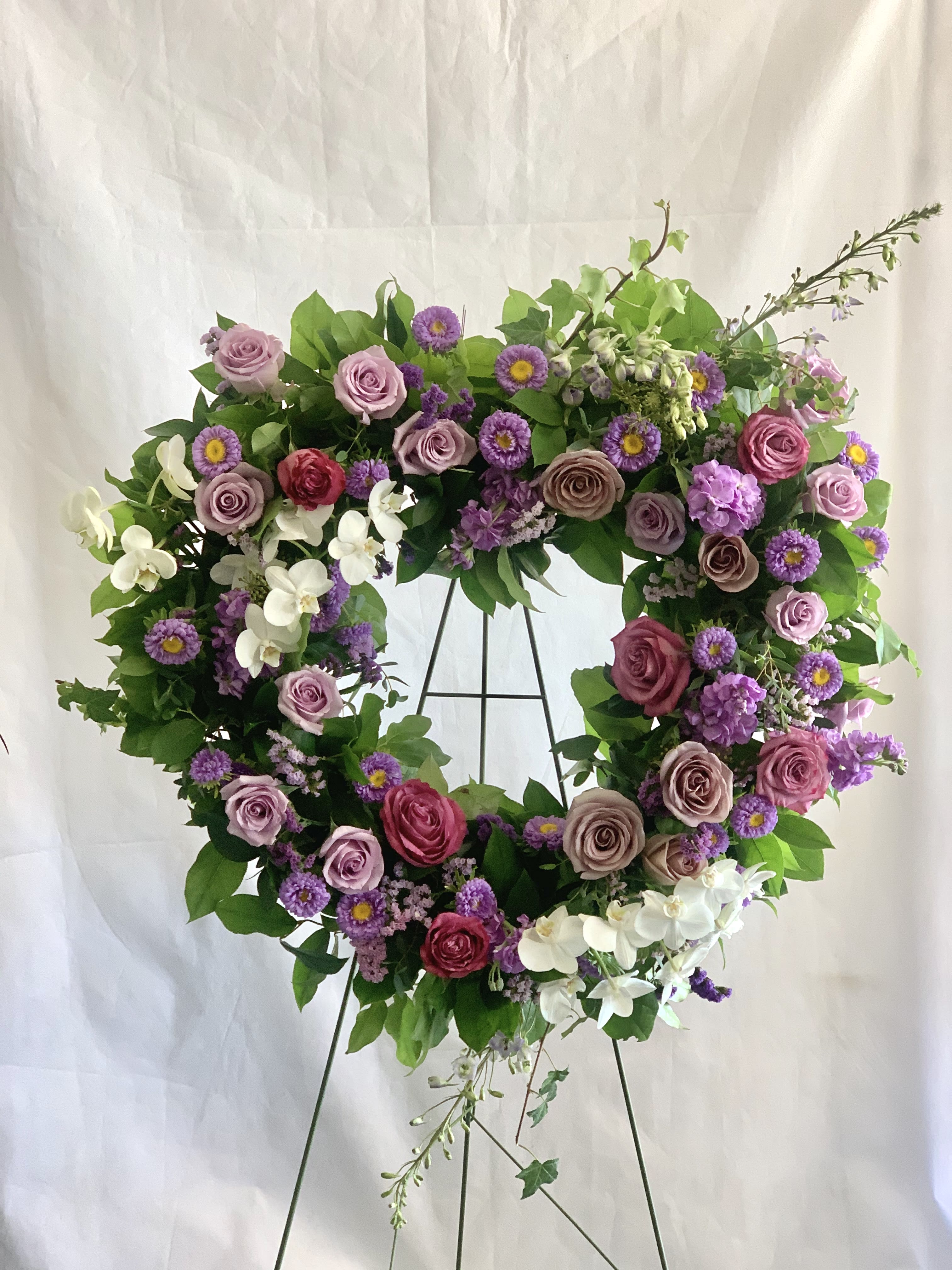 Standing Heart Wreath - A standing heart shaped wreath custom designed to your choice of colors. Picture shown is the Deluxe size.  Standard size is for 18&quot; heart wreath. Deluxe size is for 24&quot; heart wreath.  Please designate colors in the Special Instructions box.