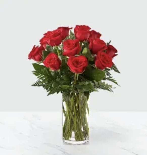 Dozen Red Rose Bouquet - There is nothing that says Valentine's Day more than red roses. They're classic, elegant and a perfect symbol of lasting romance. Your someone special will be head over heels in love when our handcrafted Gorgeous Red Rose Bouquet arrives at their doorstep. 