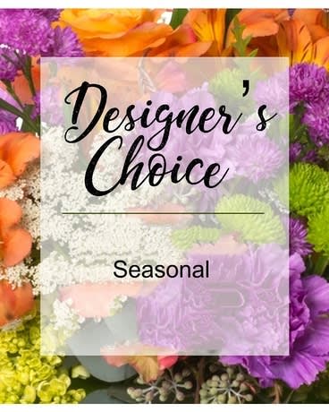 Designer's Choice Seasonal Designer's Choice Seasonal - Perfect for any occasion. We pick the freshest flowers for this seasonal mix which makes a beautiful gift for any occasion. Floral colors and varieties will vary depending on availability but your order will be filled to value.