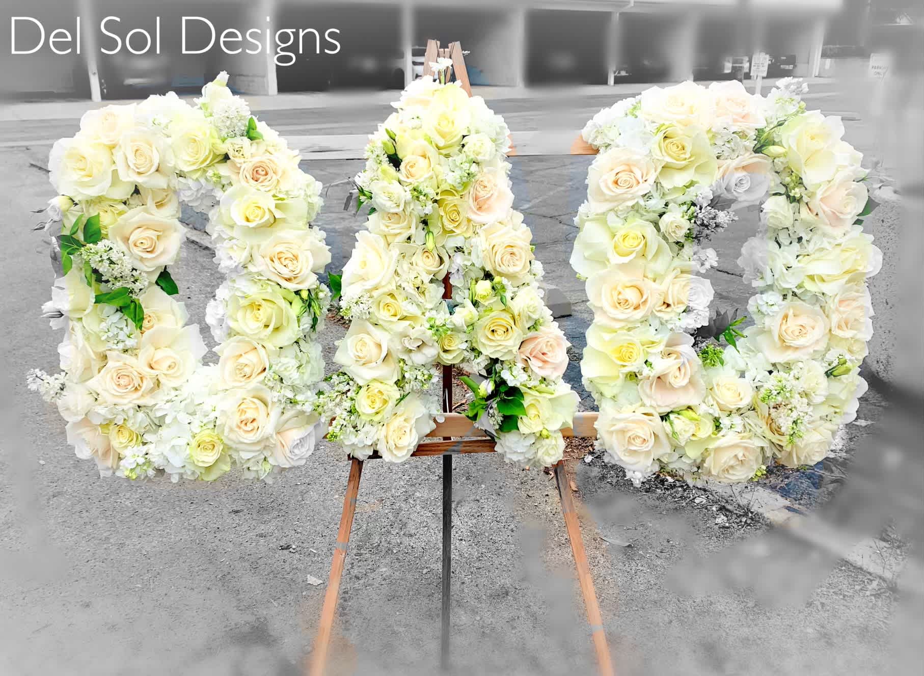 Dad Funeral Stand - This is a beautiful large DAD funeral stand pave with gorgeous flowers.