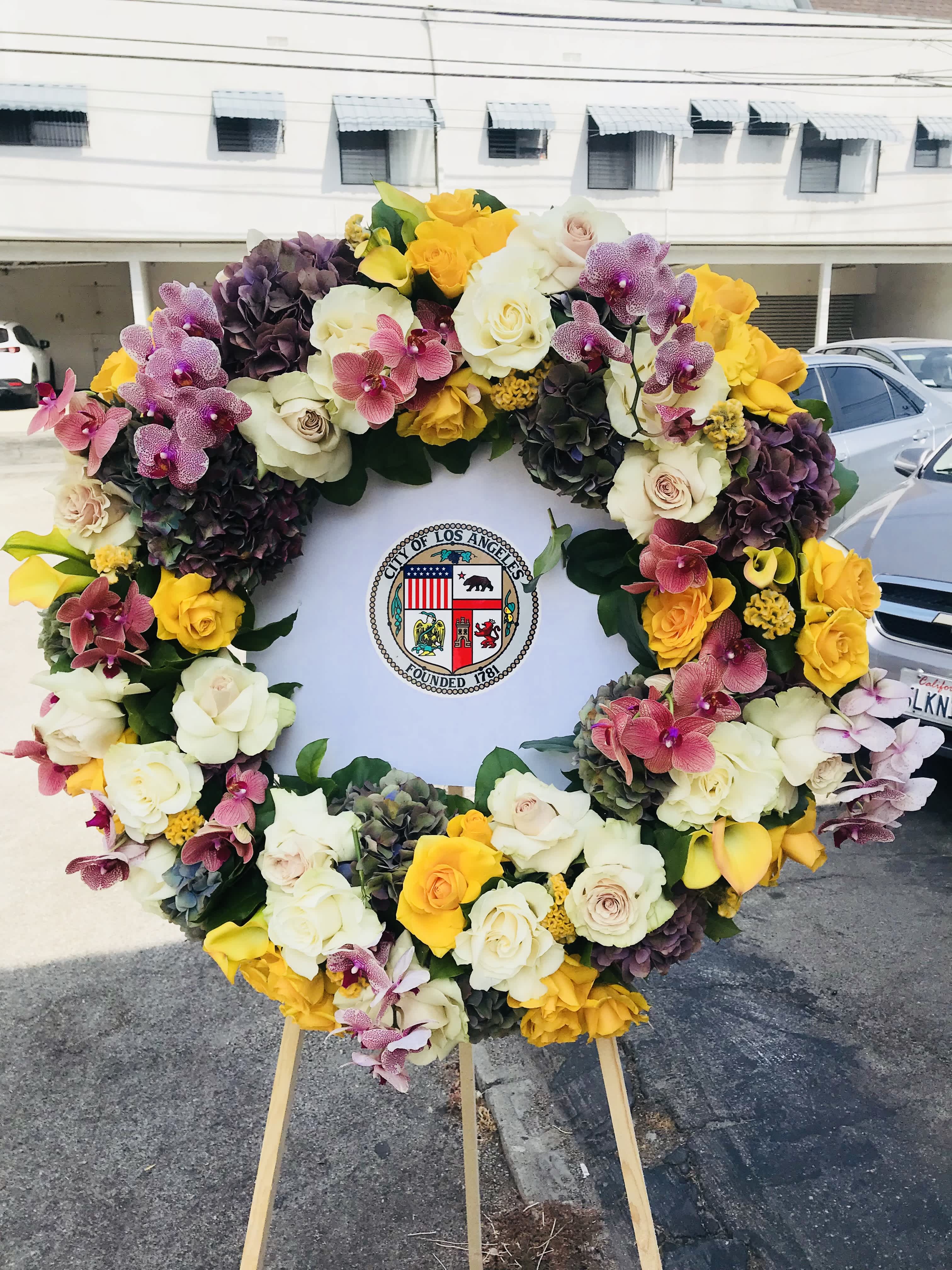 Wreath funeral for a man - This is a large beautiful wreath with any logo or picture for the middle part. Customer must provide the logo. 