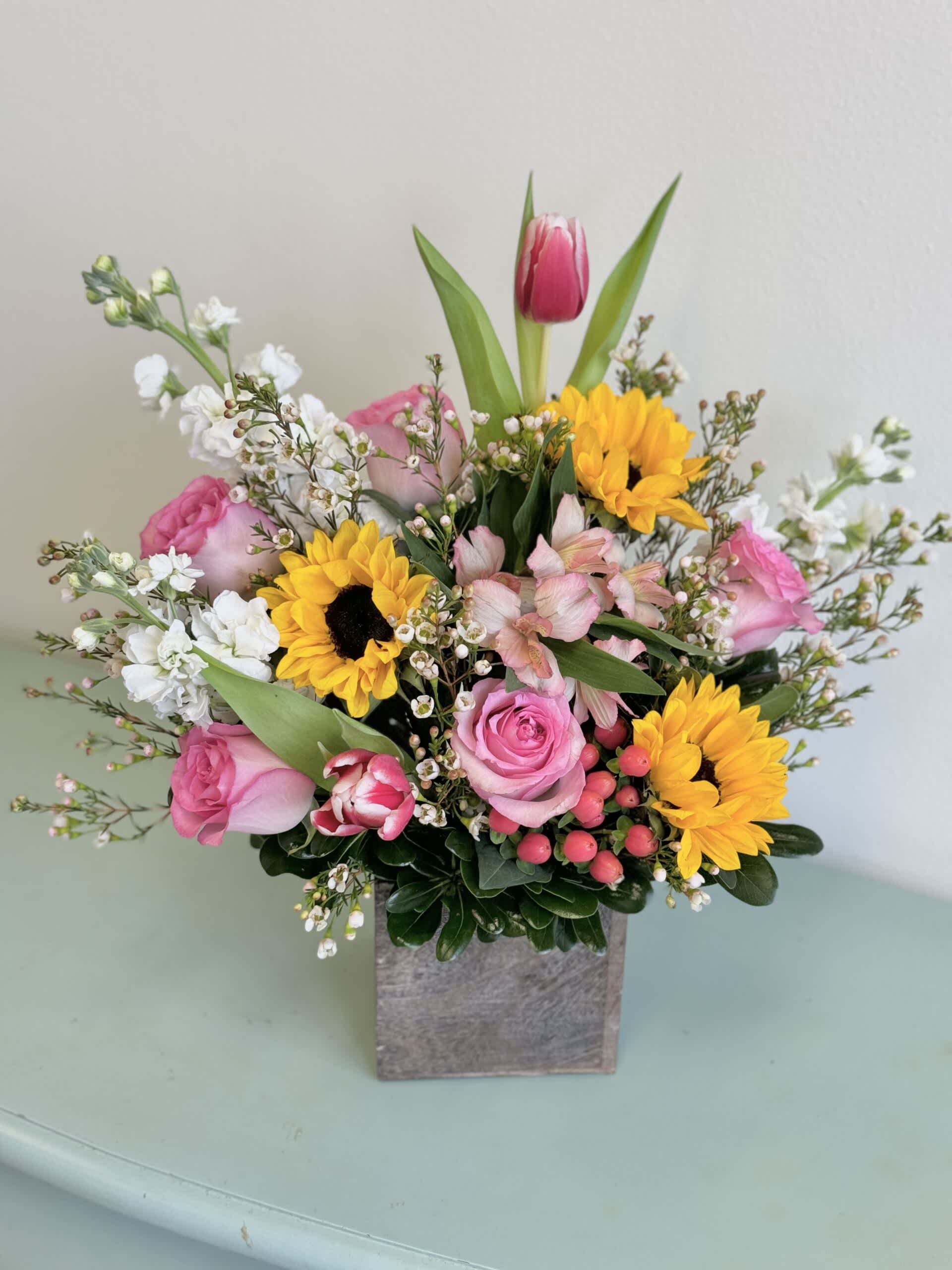 Sunny Garden - This beautiful garden arrangement is sure to put a smile on someone’s face!