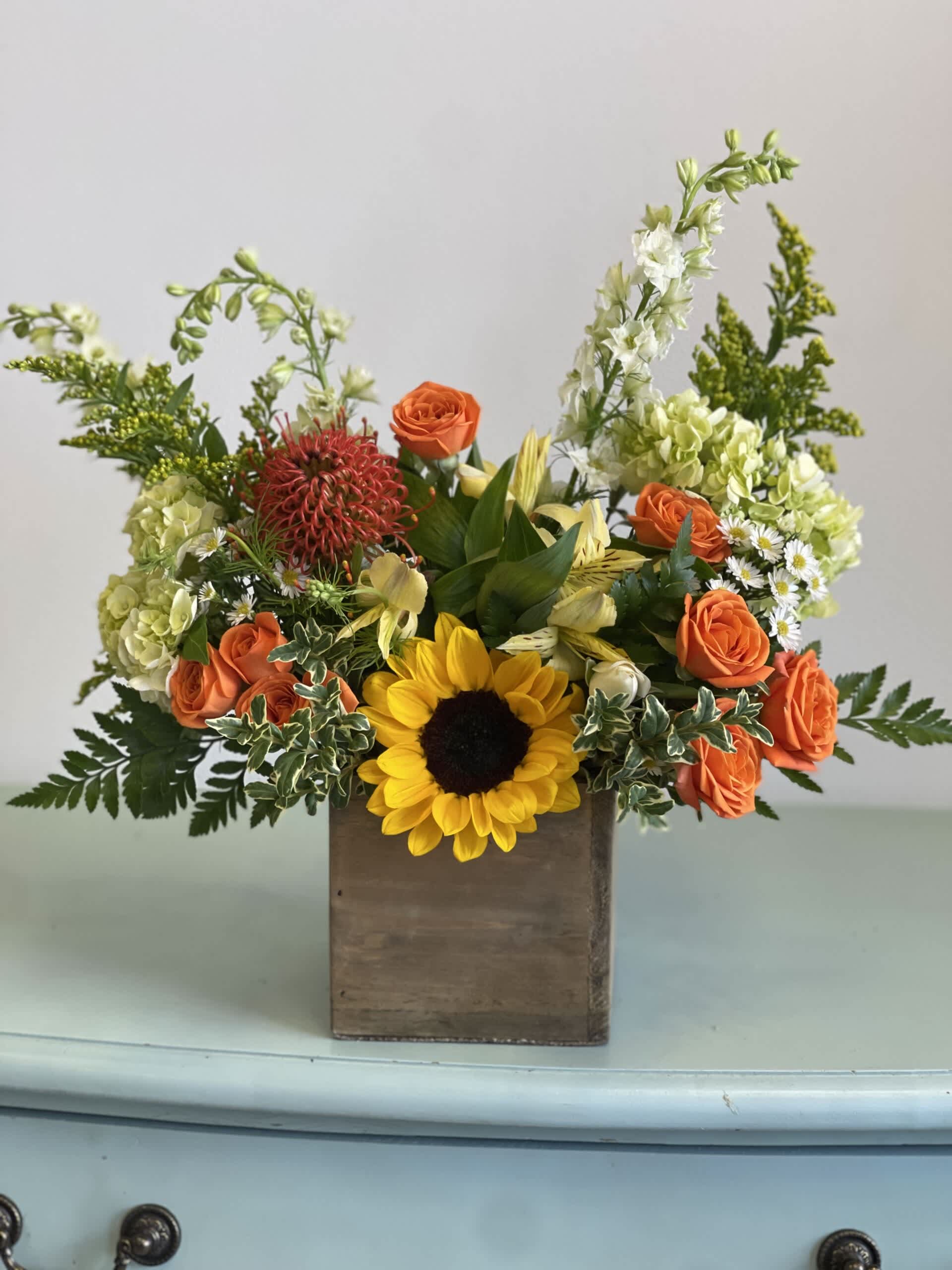 Sunshine Bloom Box - The organic feel to this arrangement will bring warmth to any space! It is sure to brighten anyone’s day!