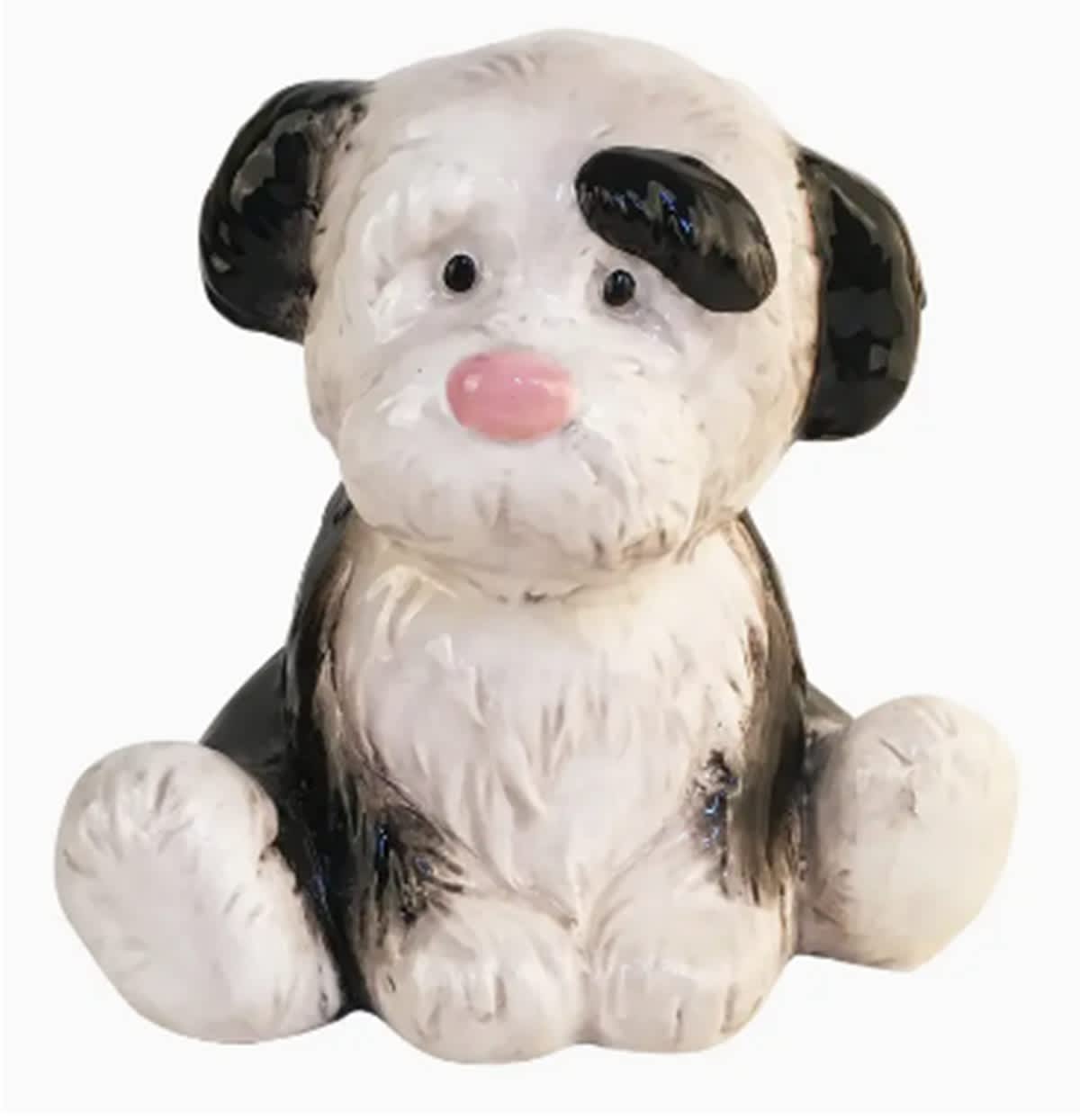 Puppy Piggy Bank - All of our piggy banks are made from only the highest quality ceramic known as dolomite for increased durability. They feature a base that is deep glazed, insuring that this essential color doesn't wear off with repeated handling. They are finished off with a shiny finishing that keeps the colors of all of the underlying components locked in place, meaning that you never have to worry about compromising the quality of the bank with repeated use. 