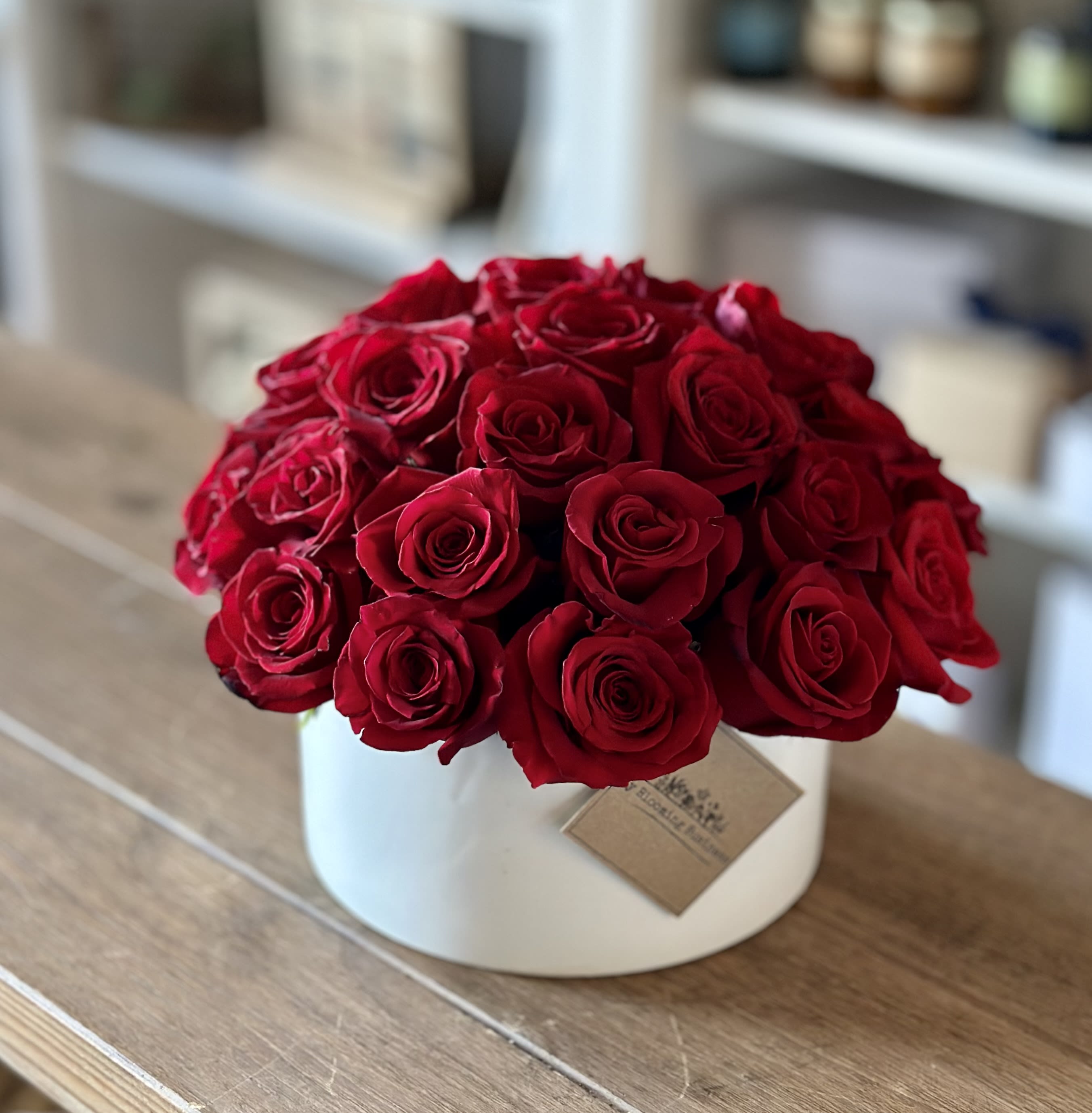 Best of my Love - &quot;Best of my Love&quot; arrangement like the famous song by the Emotions. Has 30 Red Roses in a white ceramic cylinder vase. This is the perfect arrangement to send to make them smile with glee, and show them love and affection with Best of my Love. 