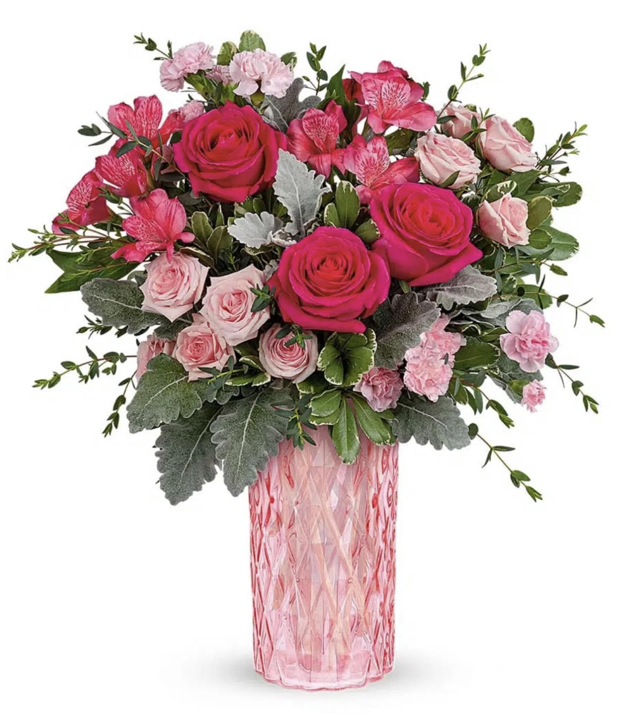 Love's Reflection Vase - With its intricate diamond-cut design and pretty pink hue, this amazing glass vase and perfect pink rose bouquet will take their breath away--on Valentine's Day, Mother's Day and beyond! Hot pink roses, miniature pink carnations, dark pink alstroemeria and light pink spray roses are arranged with parvifolia eucalyptus, dusty miller and variegated pittosporum. Delivered in a Love's Reflection vase.   