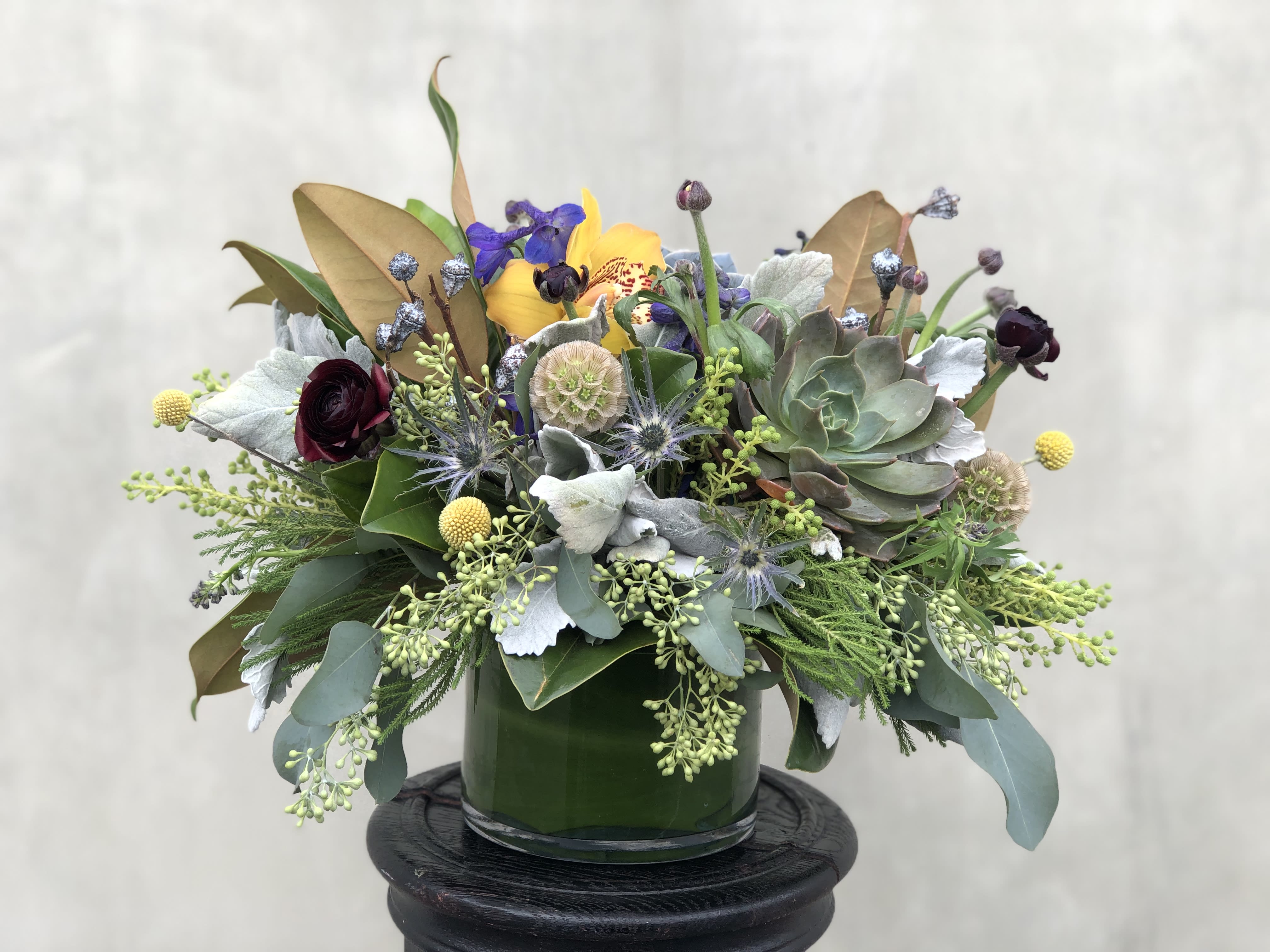 Love Succulent Love Succulent - Funky & fresh, this succulent arrangement is great for your favorite garden enthusiast! The best part is that the glass vase and the succulents can be re-purposed once the rest of your arrangement has expired.