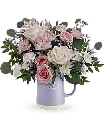 Teleflora's Blossom Delight Bouquet - Gift Mom timeless elegance with our Teleflora's Sweetest Flutter pitcher. This food-safe ceramic pitcher is adorned with an embossed butterfly and a soothing lavender finish, making it the perfect complement to a vibrant Mother's Day bouquet.
