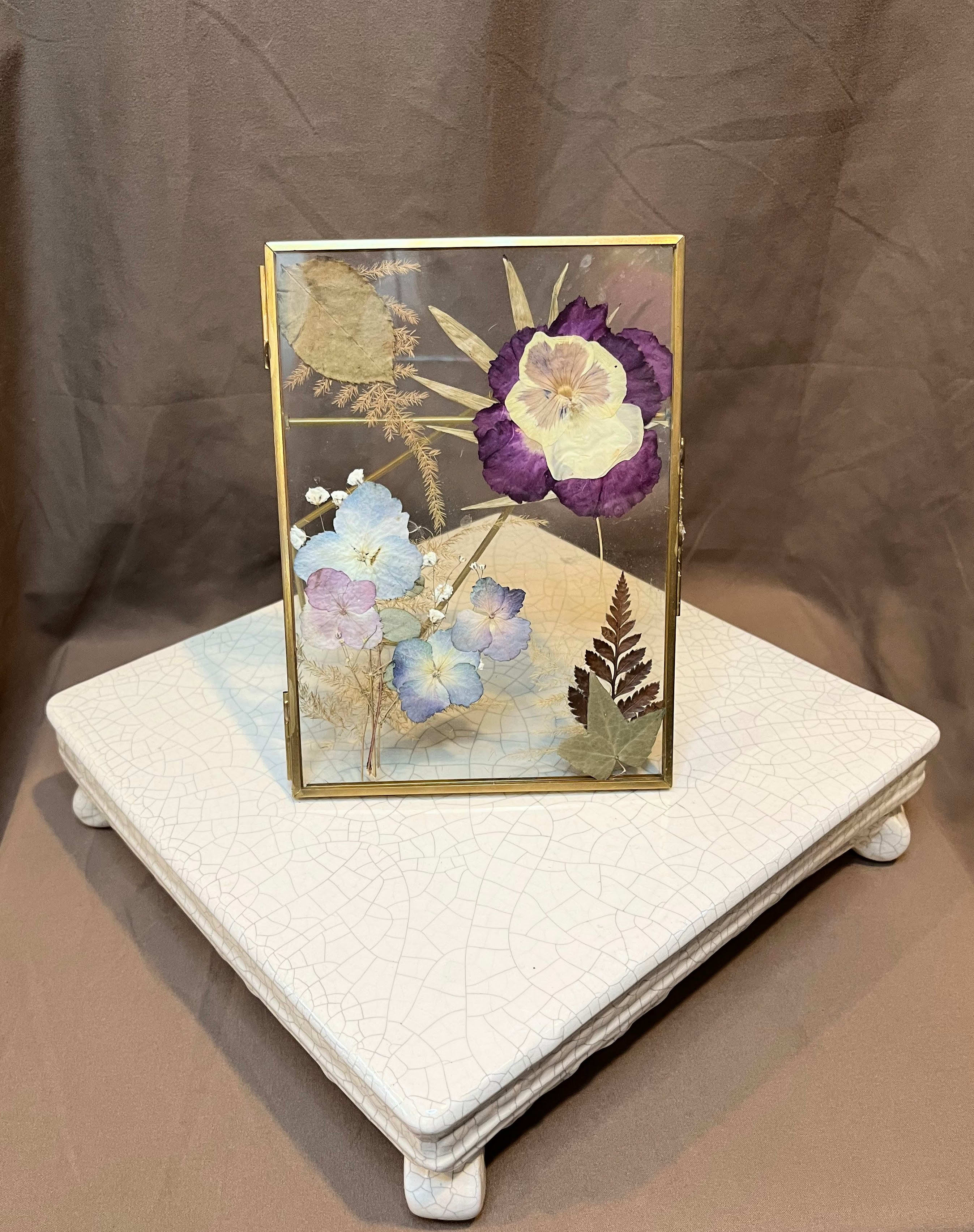 Pressed Flower Frame - Blue and Purple - Looking for something pretty and natural looking to display in your space? These hand-made pressed flower frames are the perfect touch! Made with real pressed flowers, our pressed flower frames are the perfect gift for any season. 