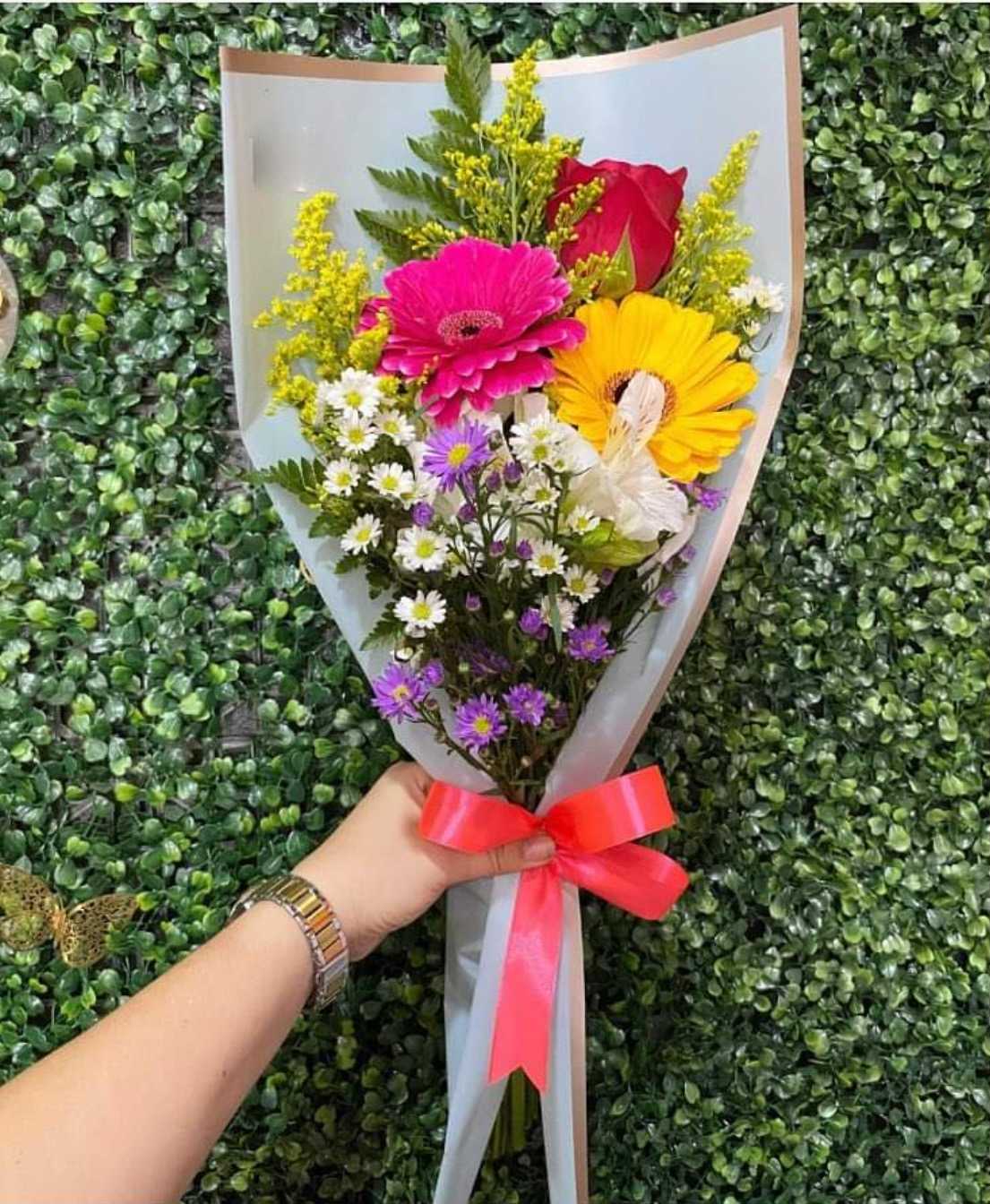 Spring Small Bouquet - 2 Gerberas, 1 Rose, 1 Alstroemeria, Solidago and Montecasino in a small wrapped bouquet.  ***Paper and Flower color may vary depending on availability ***