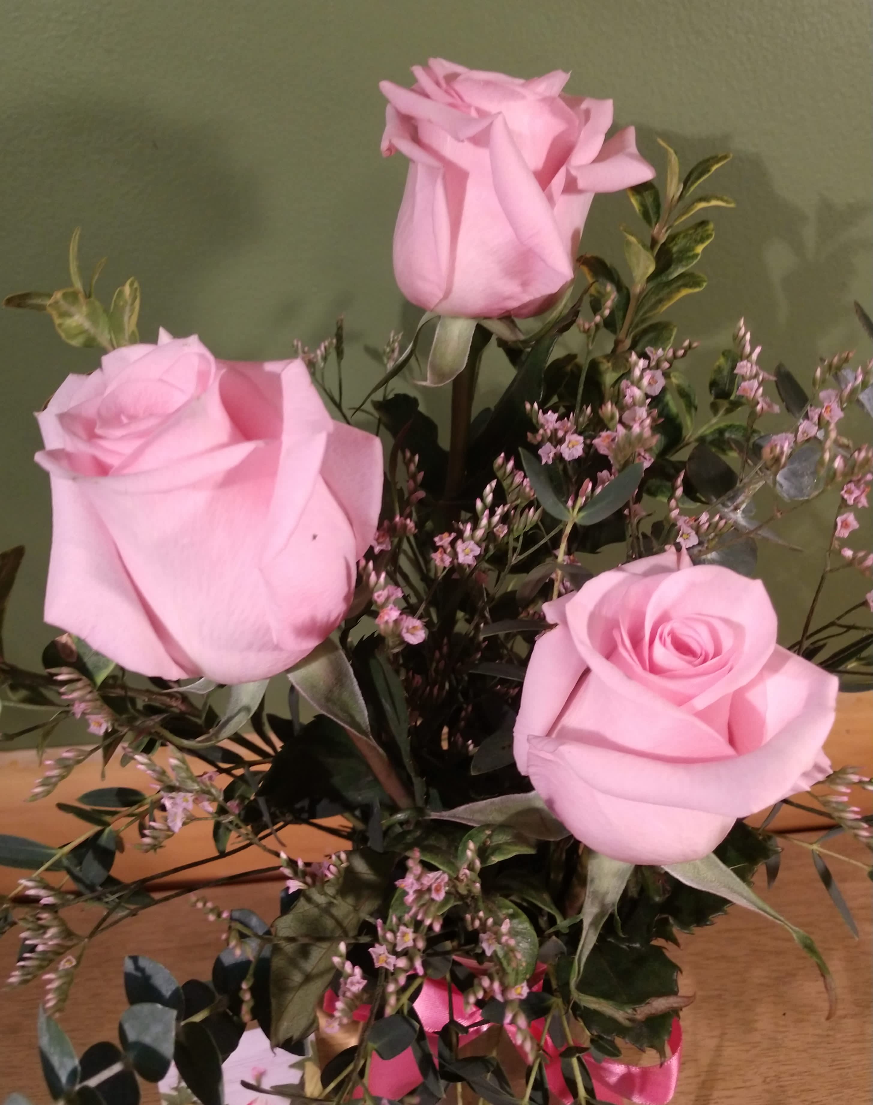 Pink Sweetness  - Say it sweeter with this feminine bouquet of pink roses and lush greens in a graceful glass vase.